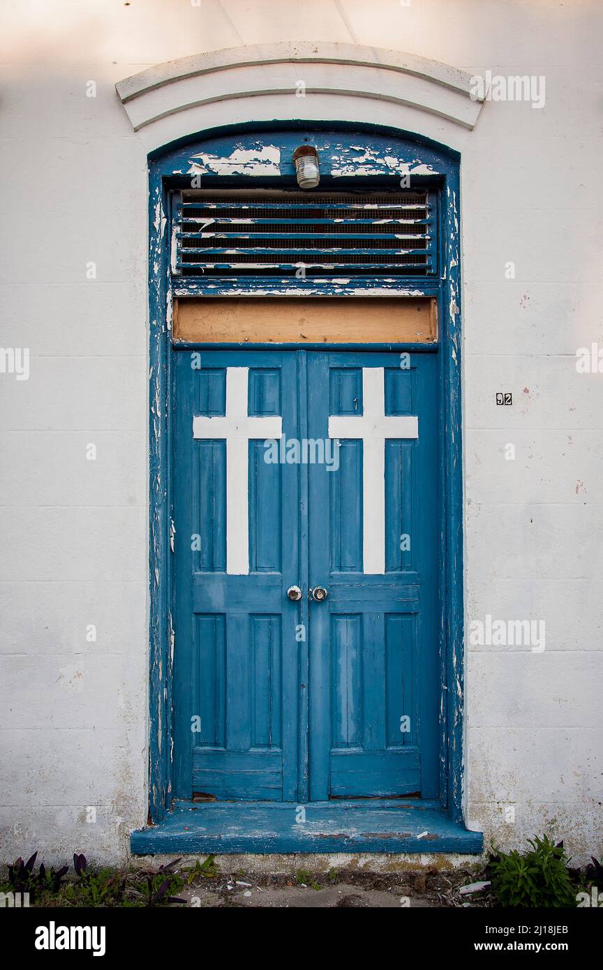 Blue Doors with Cross Stock Photo Alamy