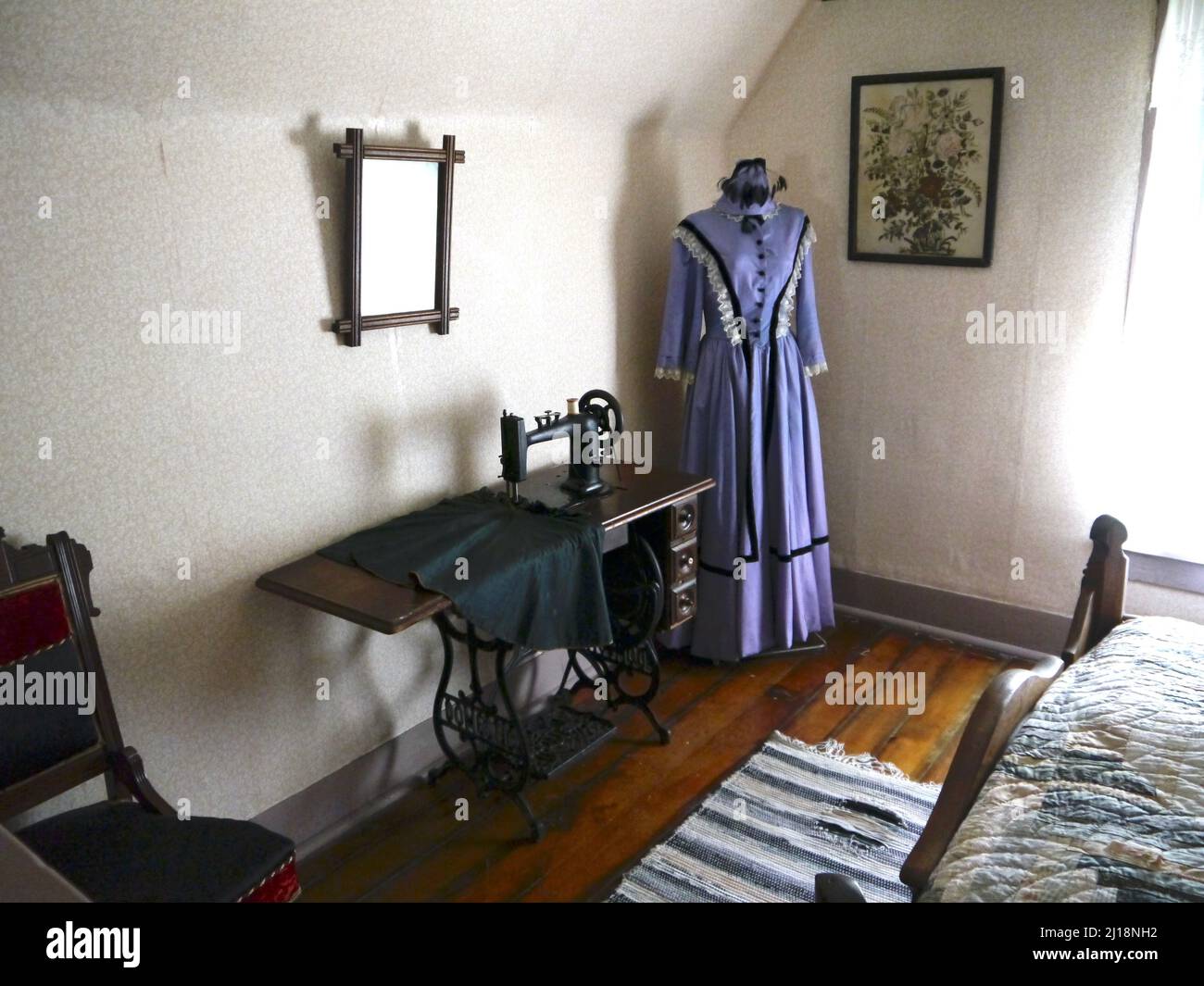 A closeup of the bedroom in the birth home of President Harry S. Truman