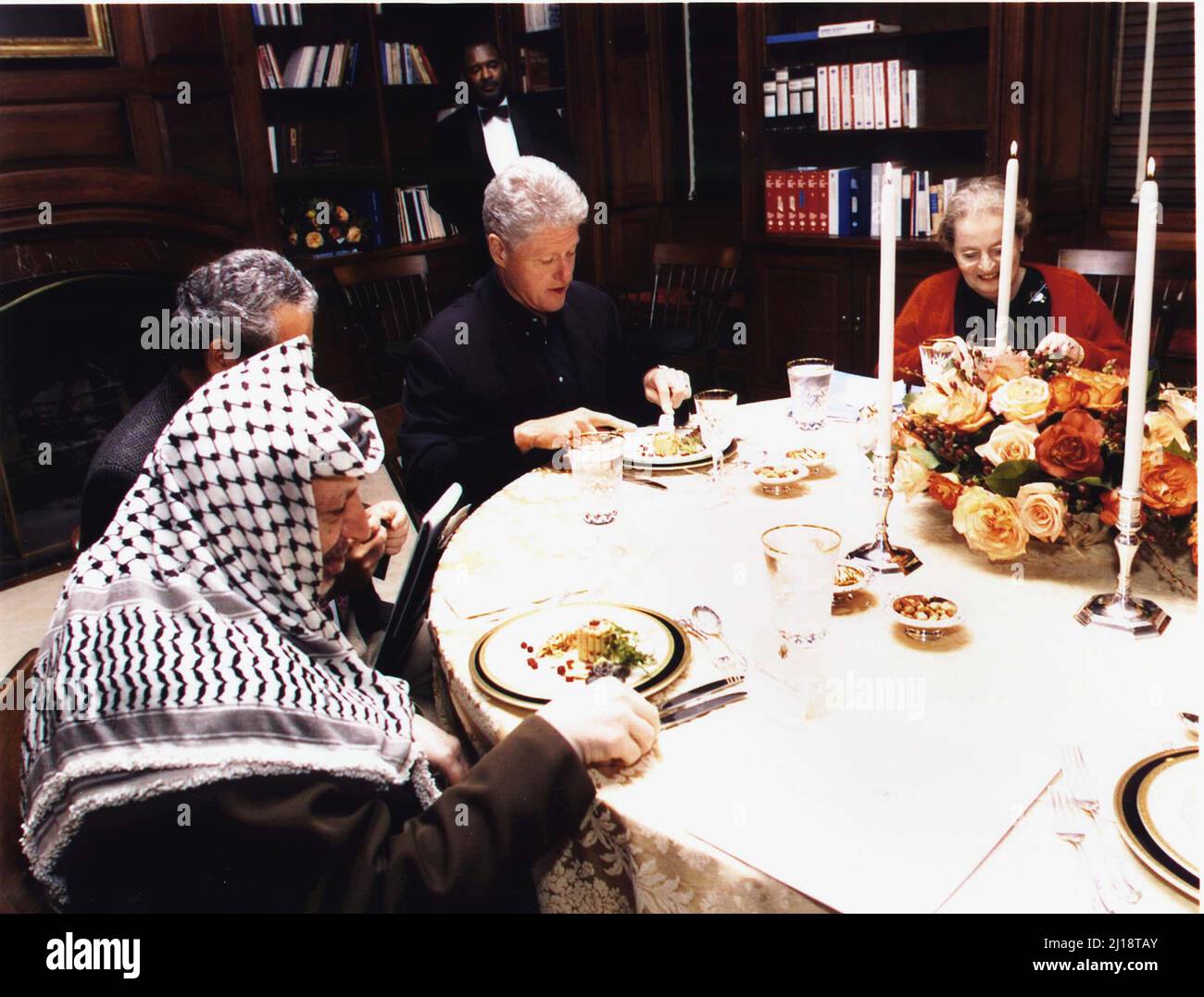 The Working Dinner at The Washington Summit at Wye River on Saturday, October 17, 1998. Pictured left to right: Palestinian Authority Chairman Yasser Arafat; Gamal Helal, The Interpreter; United States President Bill Clinton; United States Secretary of State Madeleine Albright.Mandatory Credit: White House via CNP/Sipa USA Credit: Sipa USA/Alamy Live News Stock Photo