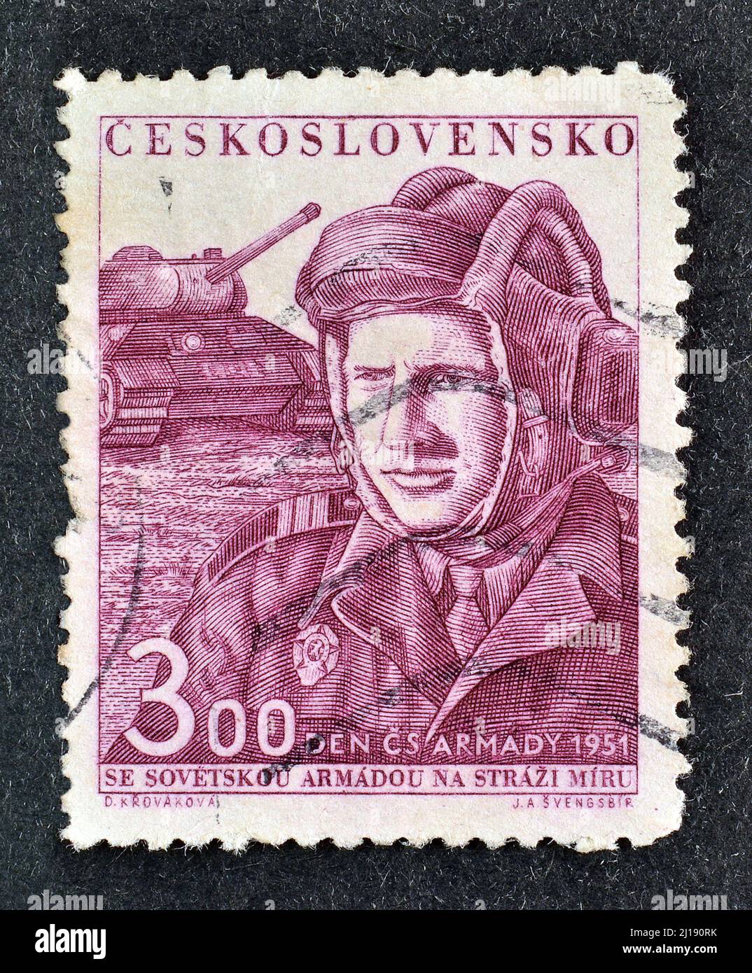 Cancelled postage stamp printed by Czechoslovakia, that shows Tankman and tank, Day of the Czechoslovak Army,  circa 1951. Stock Photo