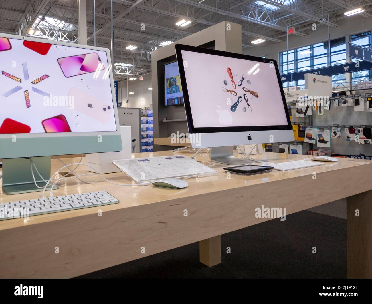 Bellevue, WA USA - circa December 2021: Angled view of an iMac display inside of a Best Buy electronics store. Stock Photo