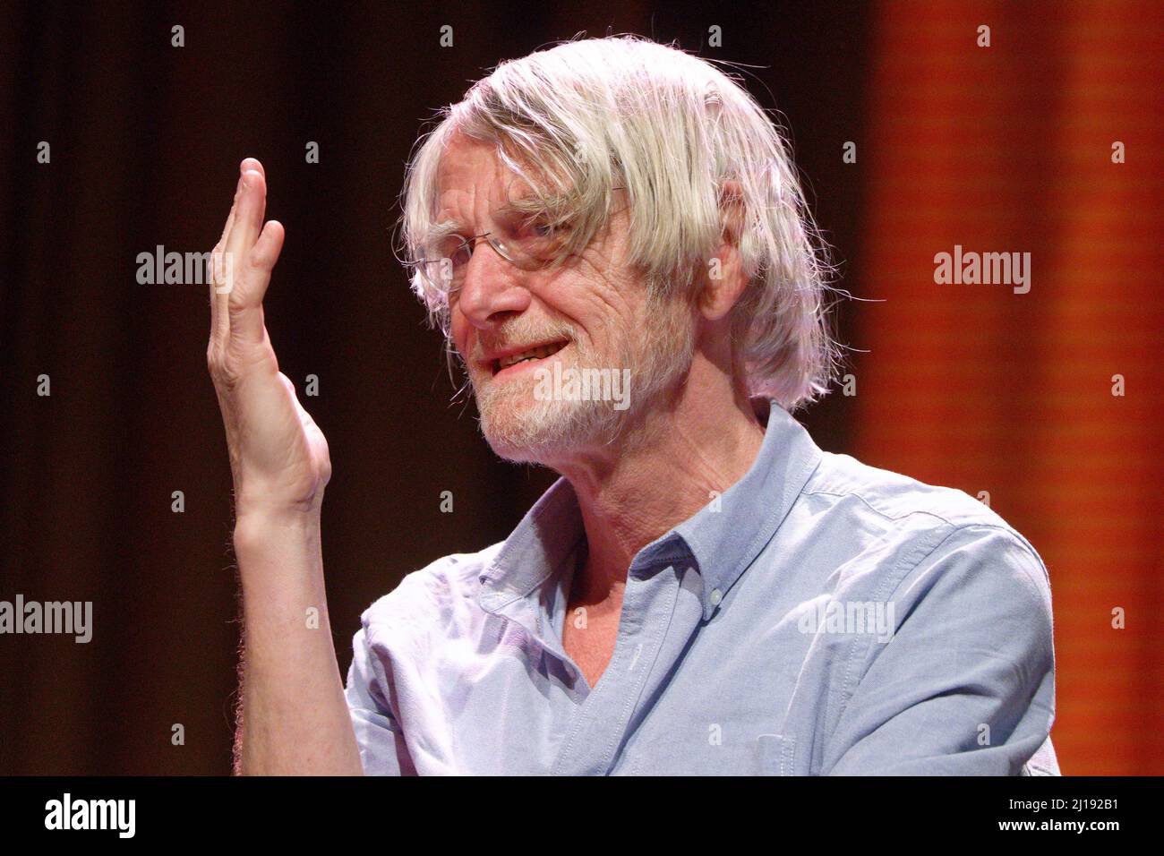 Cologne, Germany. 23rd Mar, 2022. Philosopher Philippe Van Parijs sits on stage at an event as part of the Lit.Cologne literature festival. Credit: Henning Kaiser/dpa/Alamy Live News Stock Photo