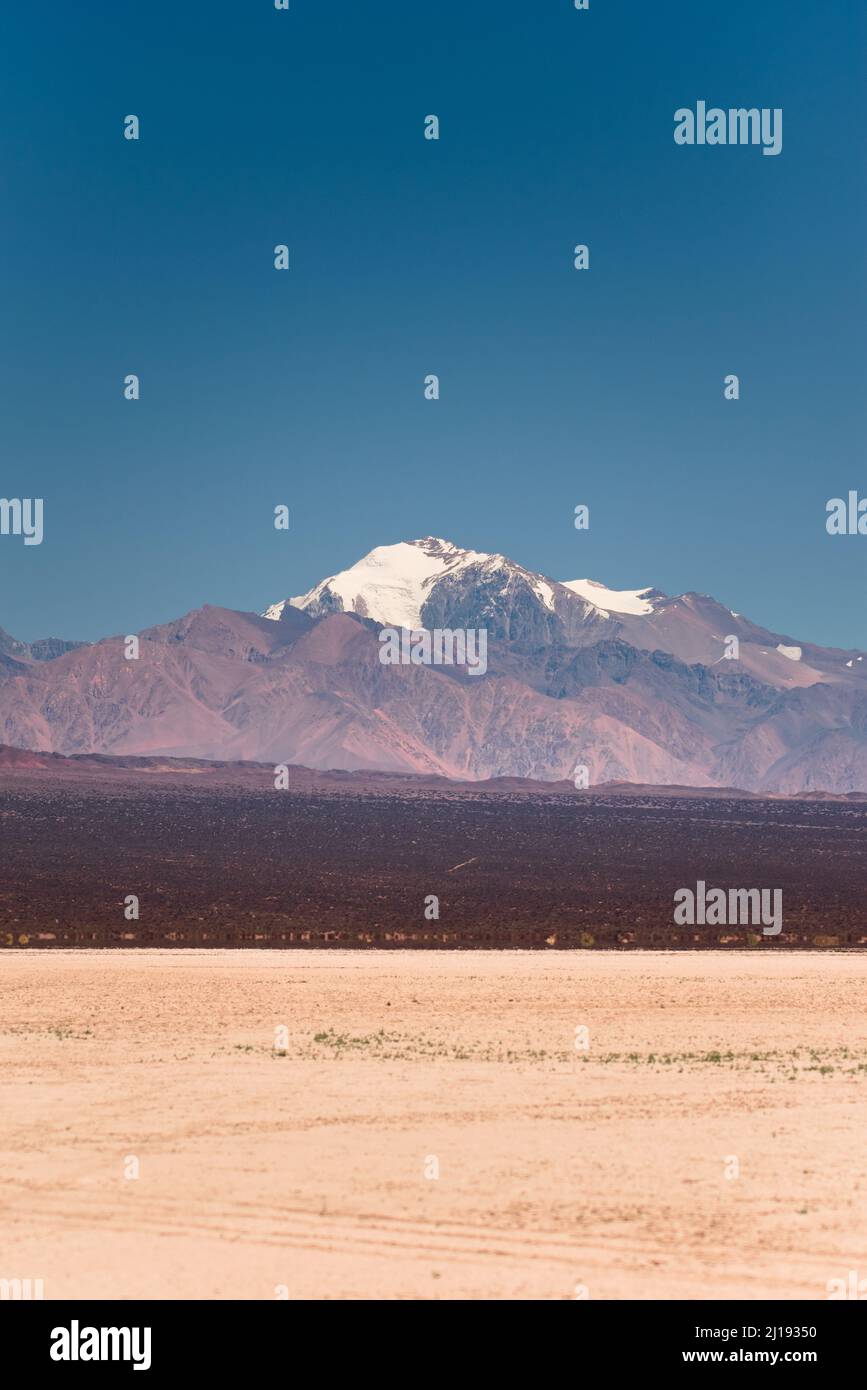 Snowy peak in the Andes Mountains, taken from natural reserve El Leoncito, located in the province of San Juan, Argentina. Stock Photo
