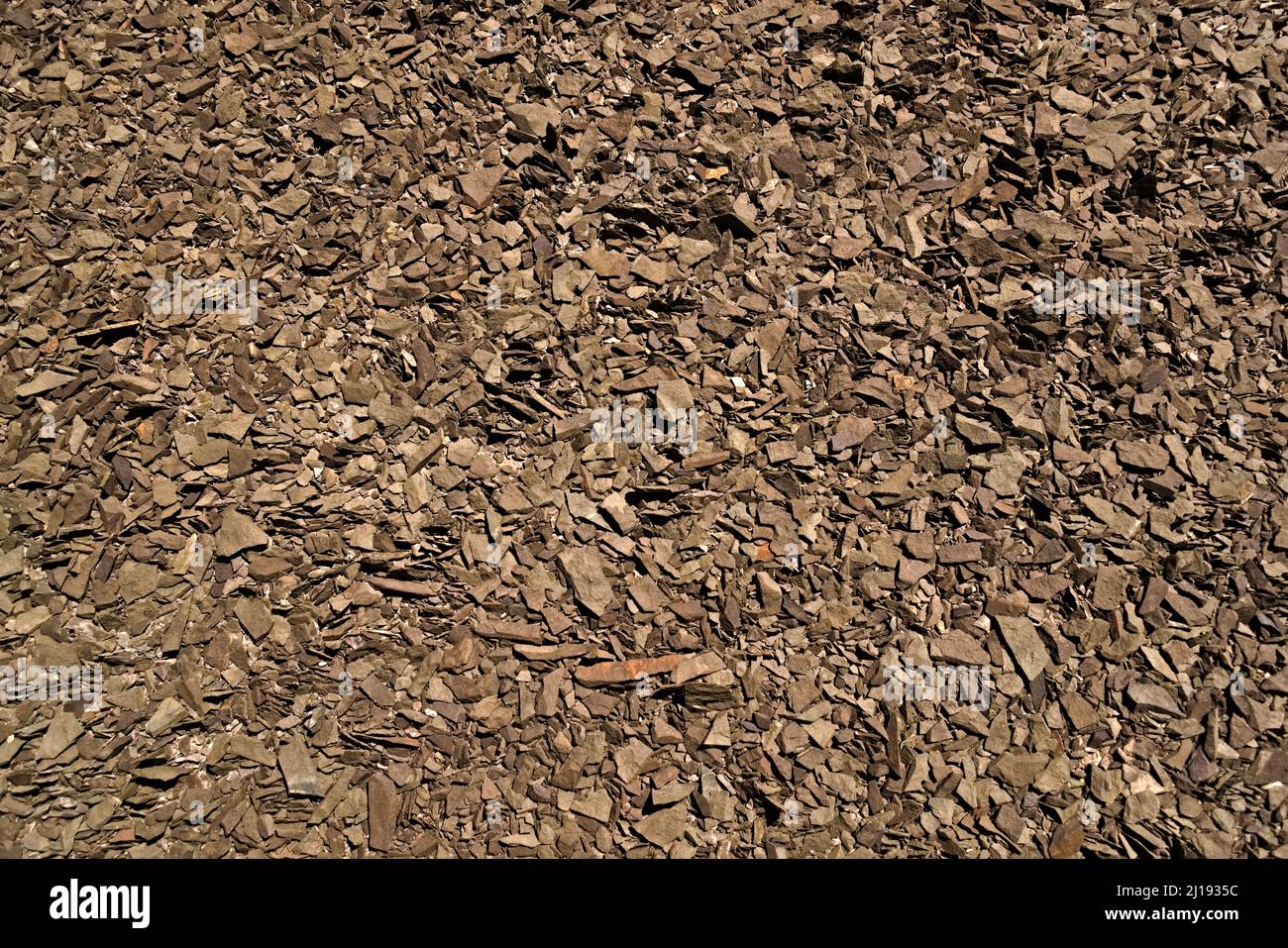 Loose volcanic rocks surface. Full frame texture. Stock Photo