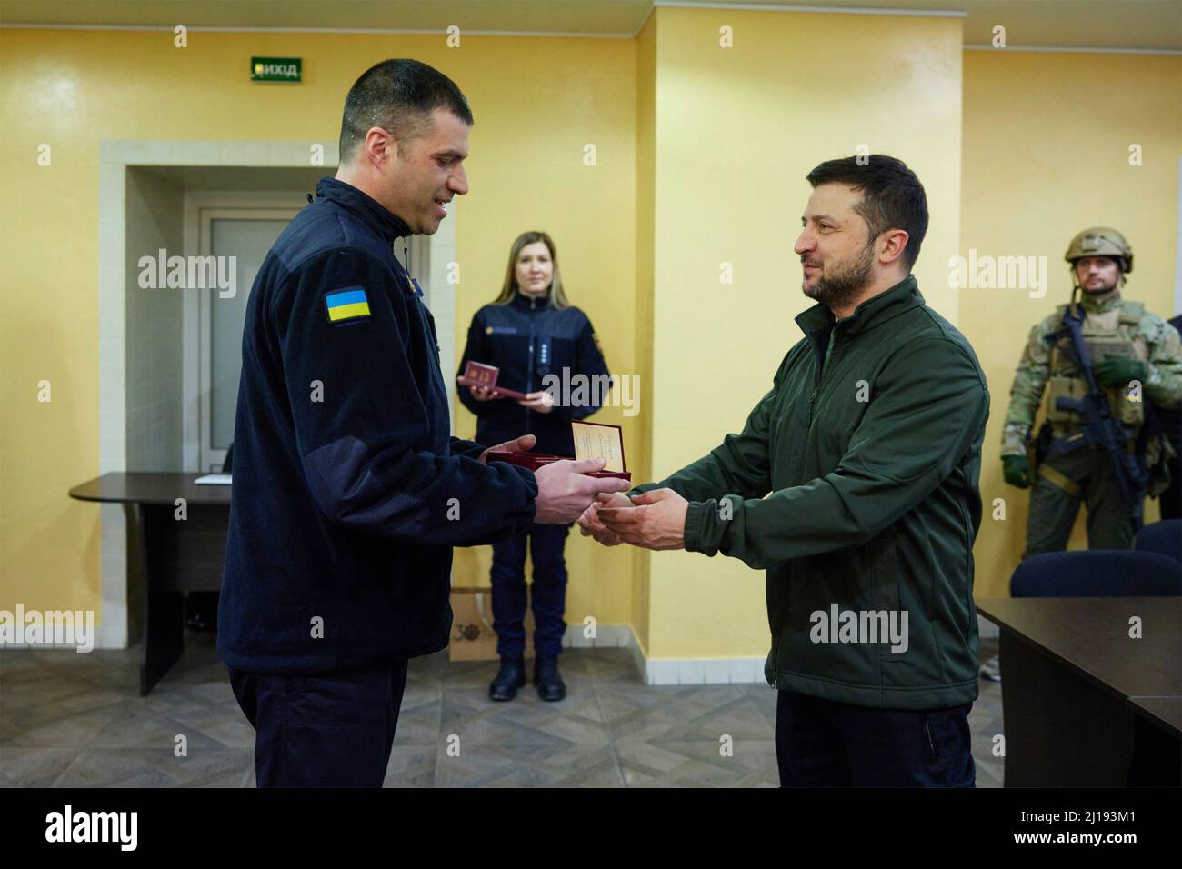Kyiv, Ukraine. 17 March, 2022. Ukrainian President Volodymyr Zelenskyy presents medal to State Emergency Service employees who fought off Russian invaders during a visit to their offices, March 17, 2022 in Kyiv, Ukraine.  Credit: Ukraine Presidency/Ukraine Presidency/Alamy Live News Stock Photo