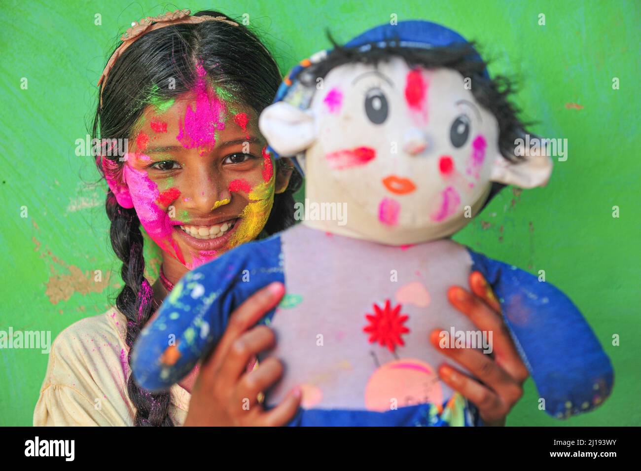 Bangladeshi children from Khan Tea garden posing for photos with their faces painted after adorning with colors like Rainbows on the celebration of th Stock Photo