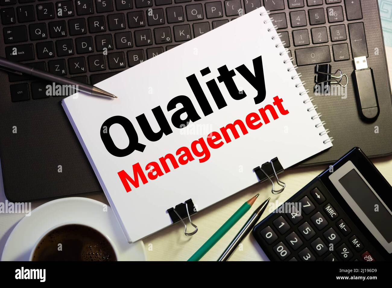 Quality management, Text message on white paper Stock Photo - Alamy