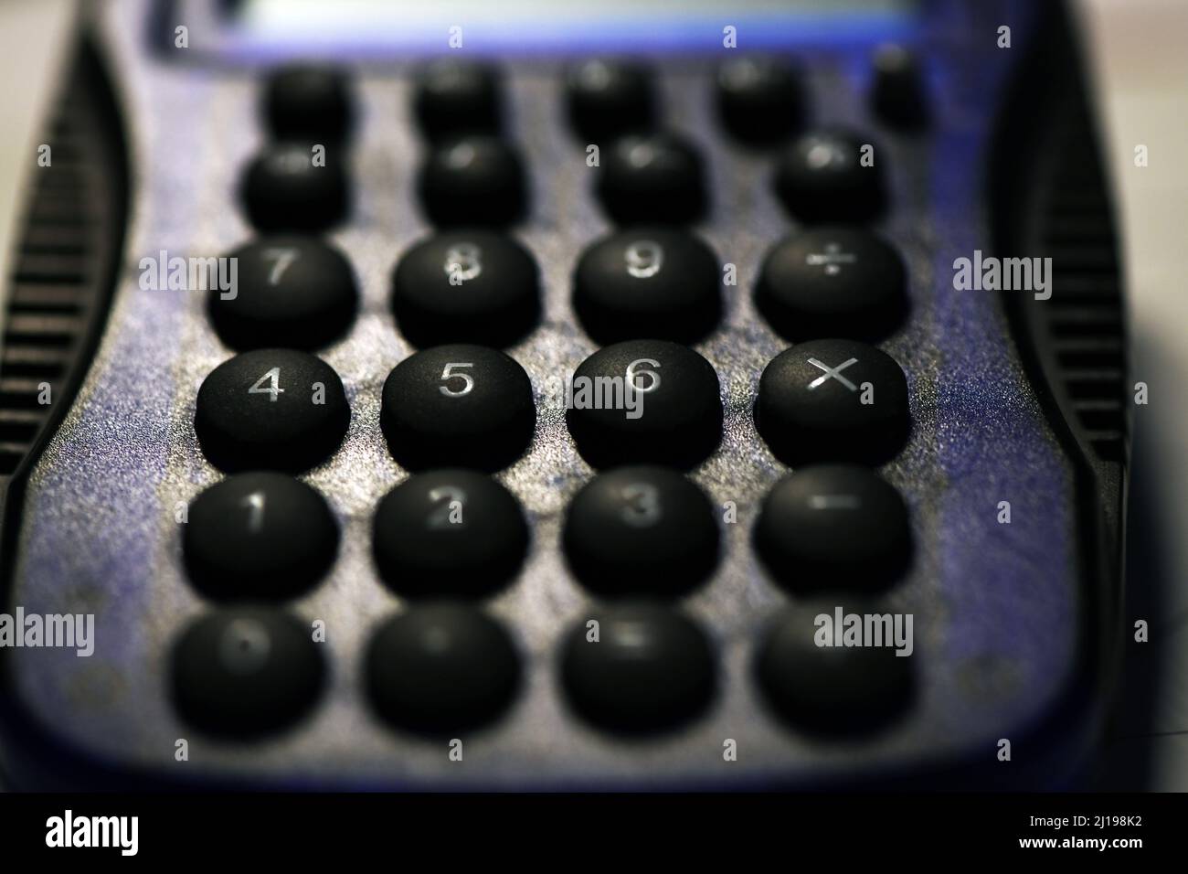 Electronic calculator for math, scientific equations and complex as well as simple projects. Stock Photo