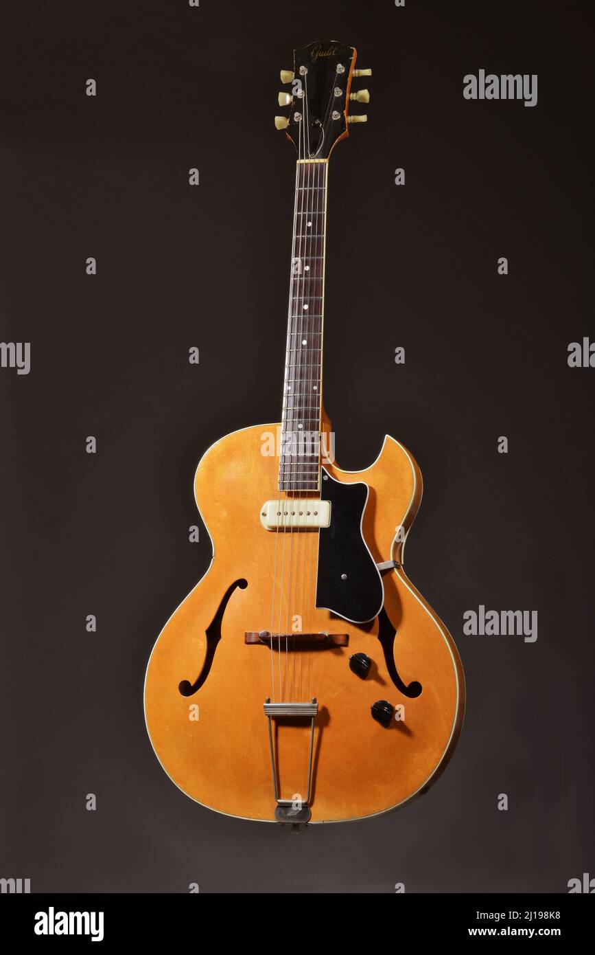Guild T-100 Blonde arch top guitar.  For country, blues and jazz. Stock Photo