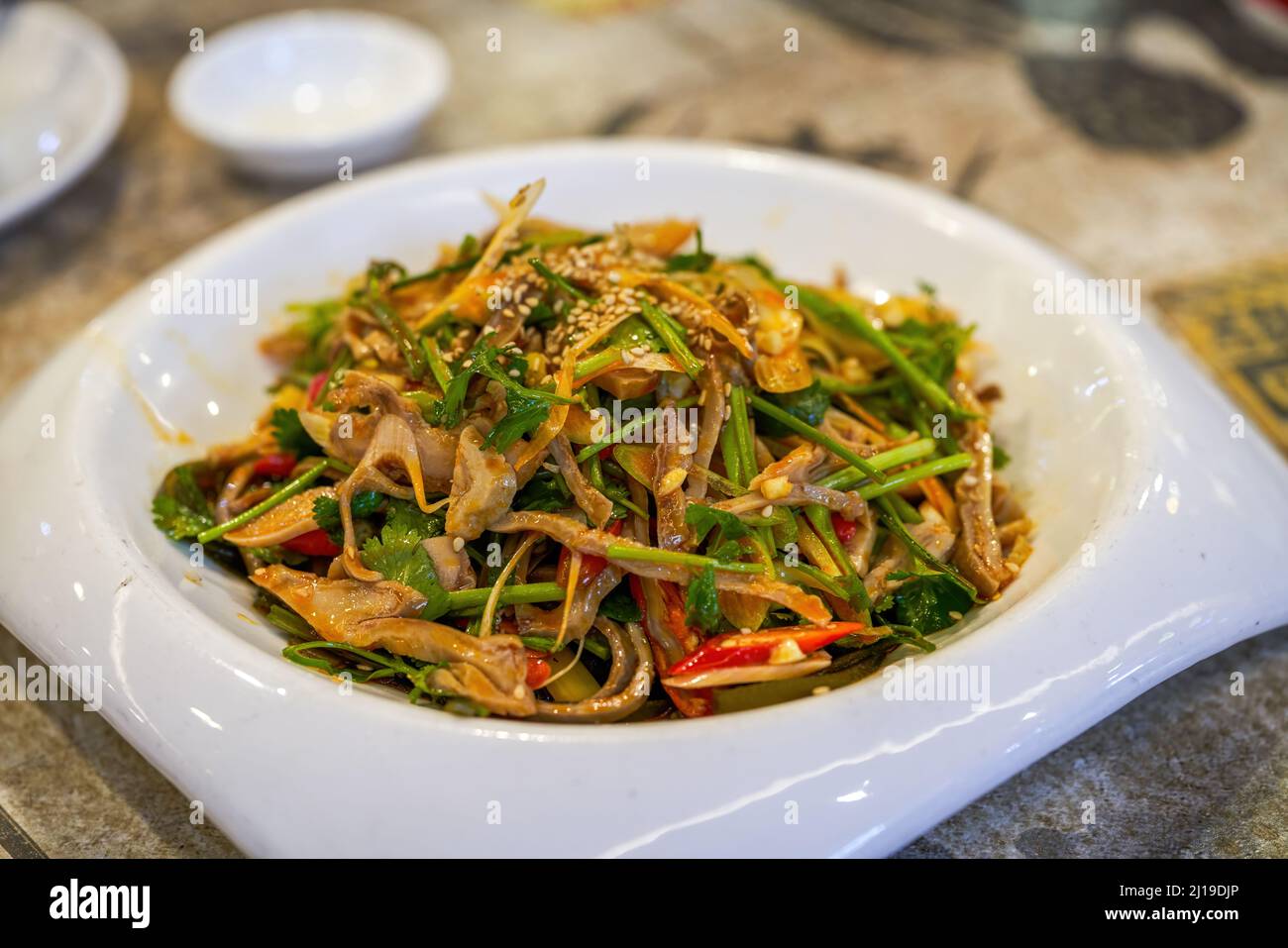 A delicious cold dish, cold coriander tofu skin Stock Photo Alamy