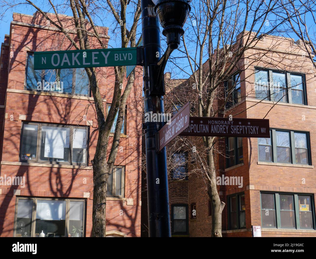 Ukranian Village Chicago street signs. Oakley Blve & Rice Street. Honorary Bishop Jaroslav Gabro Drive & Metropolitan Andrey Sheptytsky Way. Stock Photo
