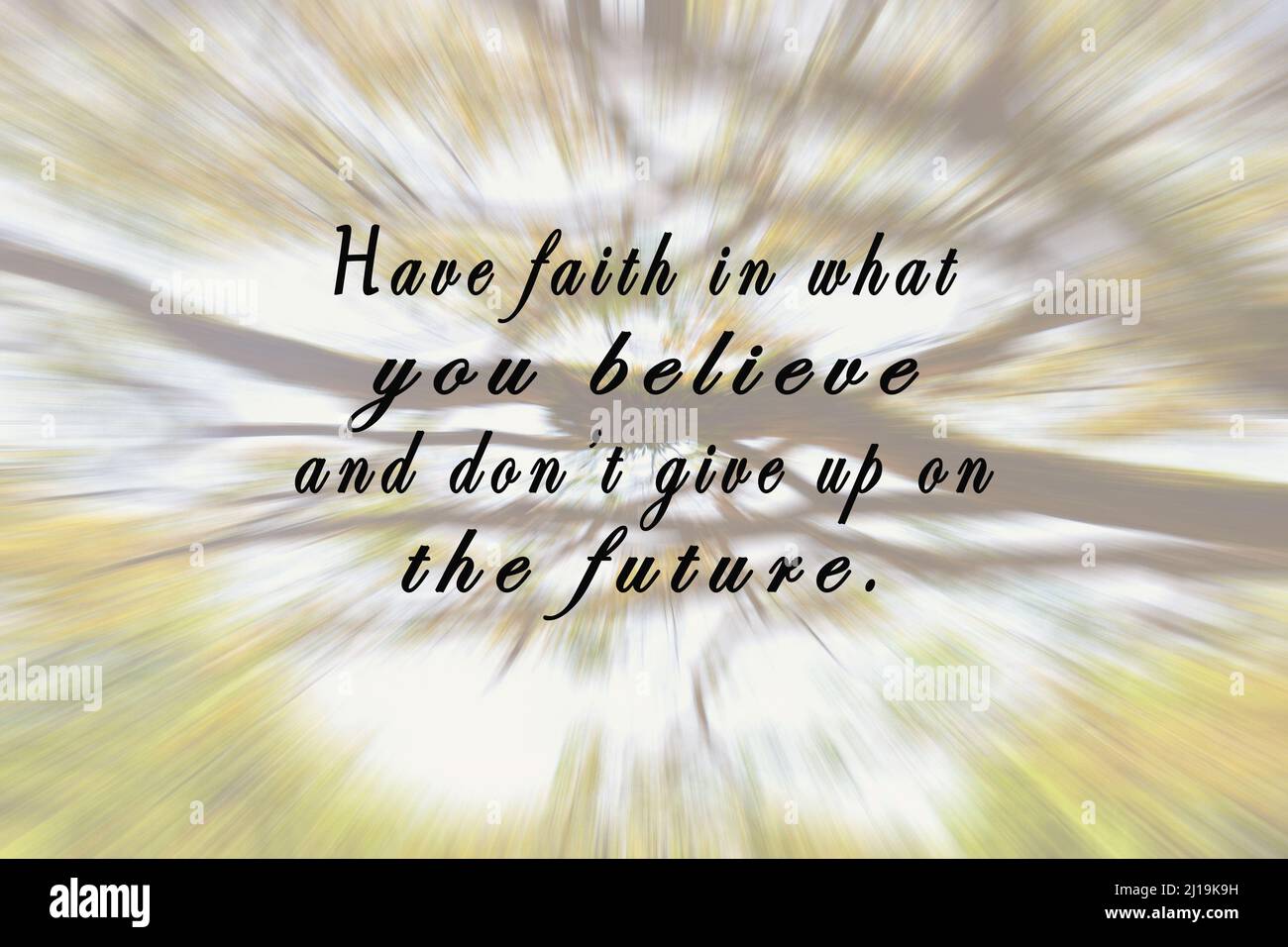 Motivational and inspirational quote on blurry trees zoom motion effect