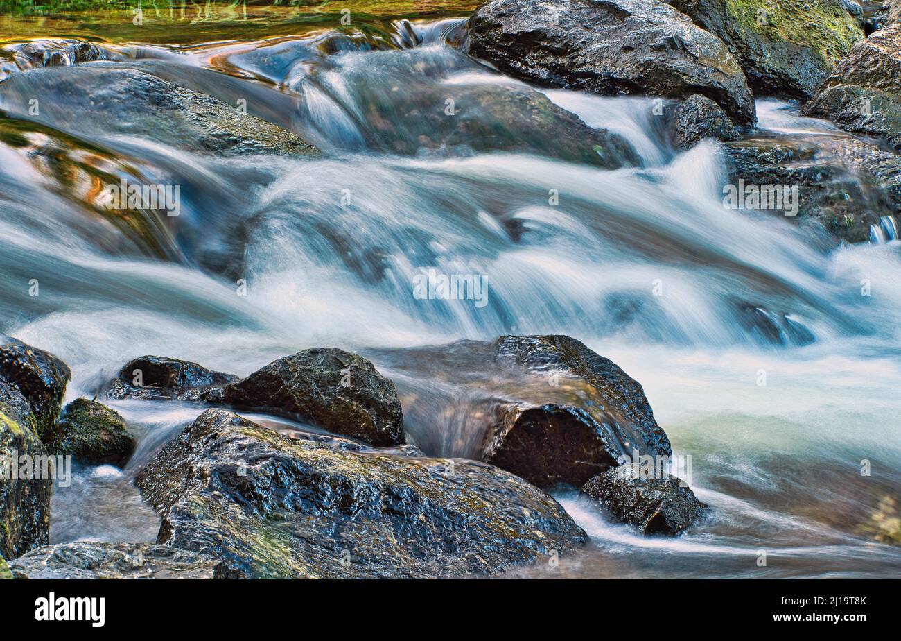 Small waterfall, long exposure, black, Rueti, Switzerland Stock Photo