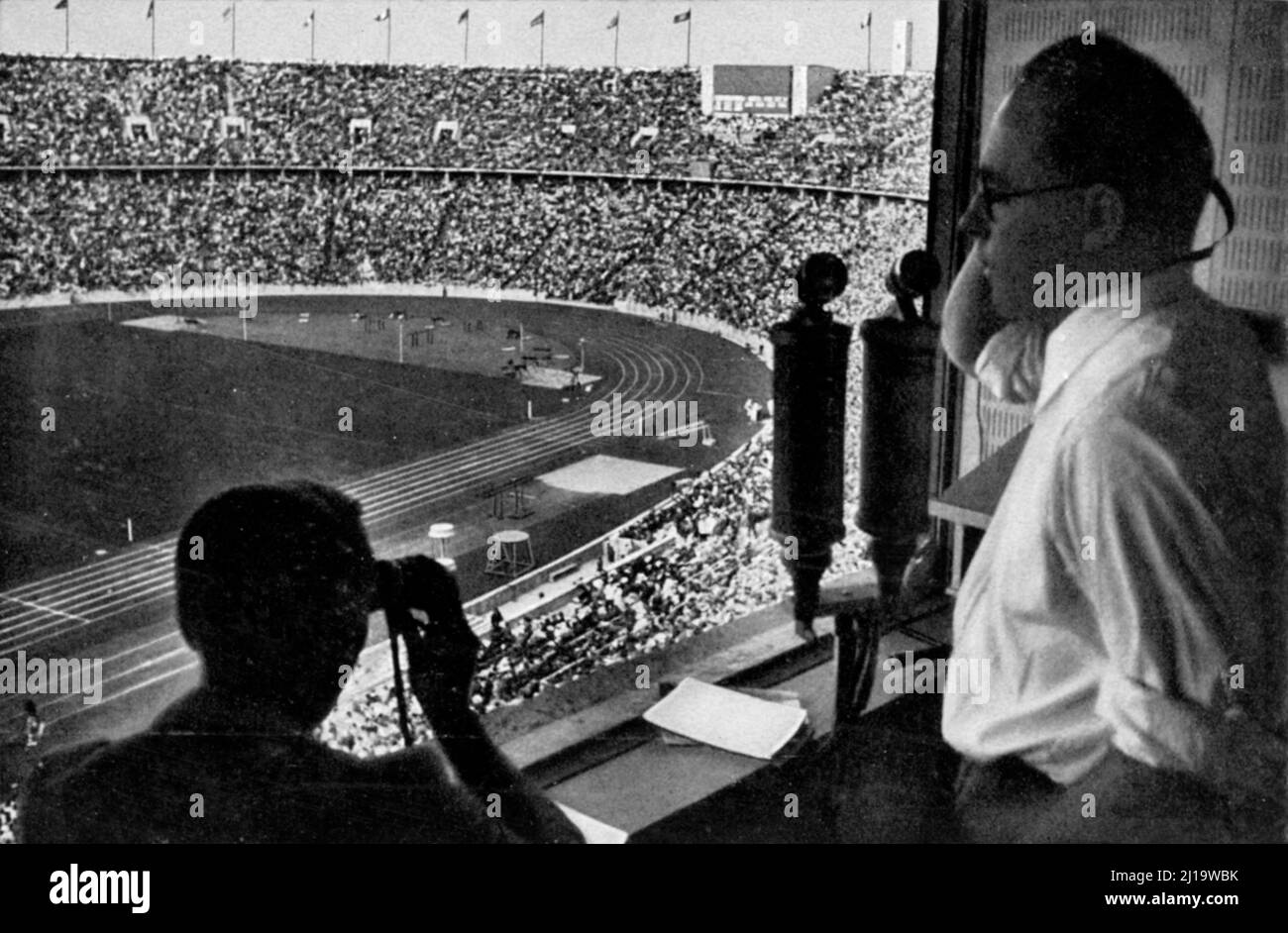 The broadcaster in his cell above the stadium Stock Photo