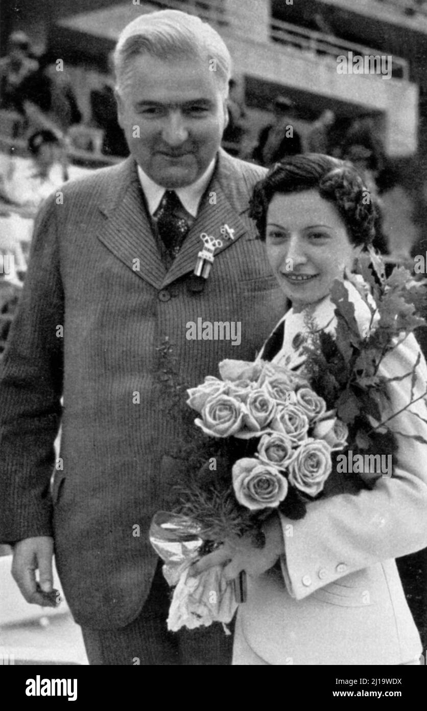 Fencing, the winner in foil fencing Ilona Elek (Germany) with her father Stock Photo