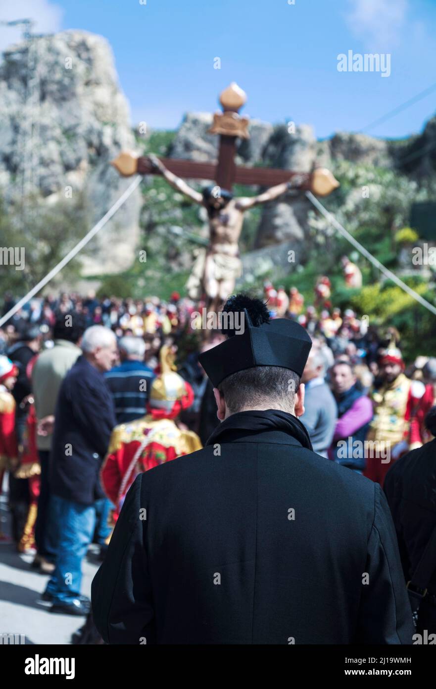 The Parish Priest during the Holy Week processions on the mountain village of San Fratello, province of Messina, Sicily, Italy Stock Photo