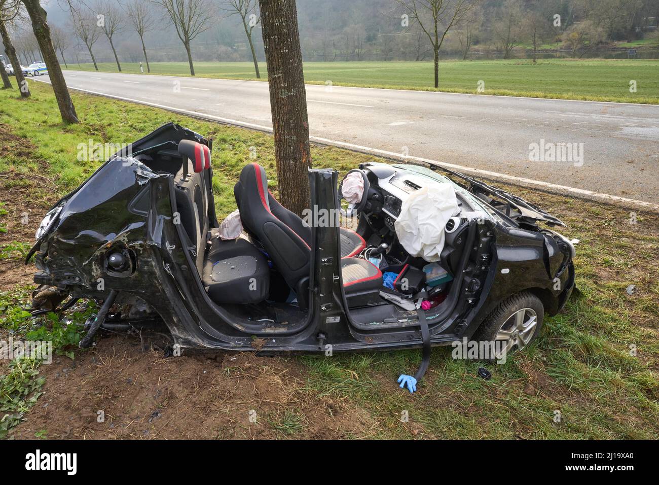 Destroyed car after deadly collision with a tree, Fachbach, Rhineland-Palatinate, Germany Stock Photo