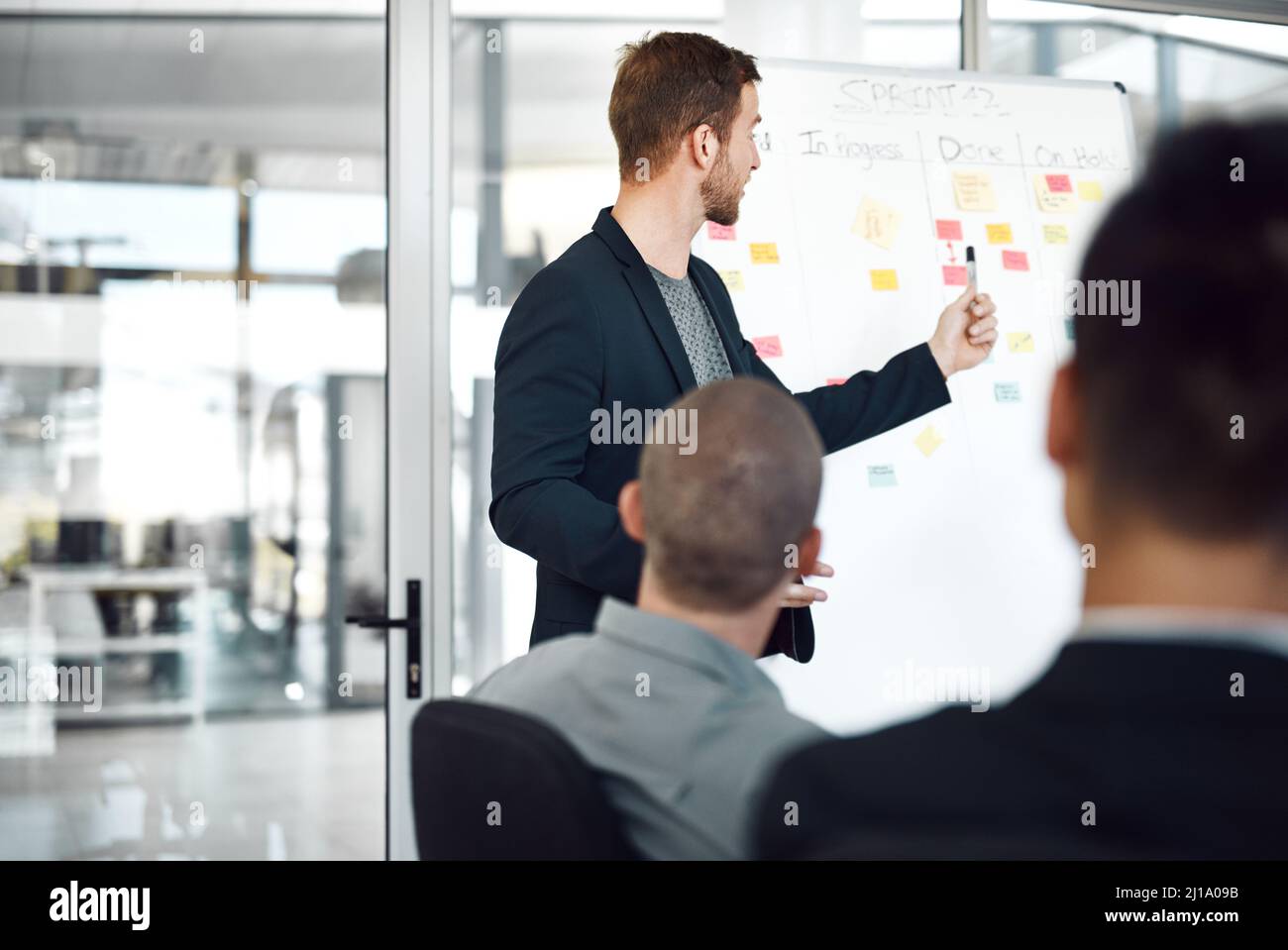 We need to innovate more. Shot of businesspeople having a meeting in a boardroom. Stock Photo