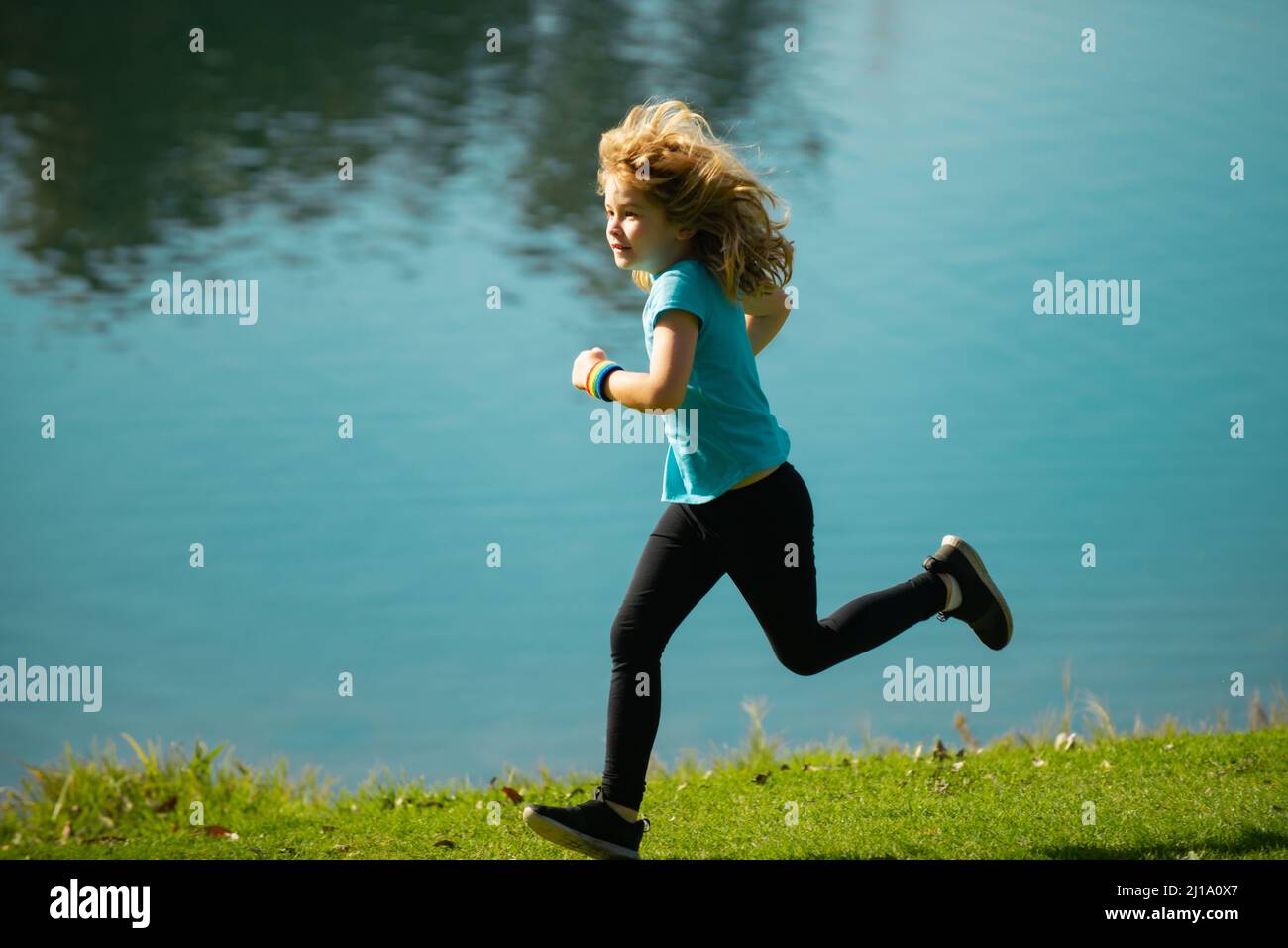 Child boy running outdoors. Child runner jogger running in the nature. Morning jogging. Active healthy kids lifestyle Stock Photo Alamy