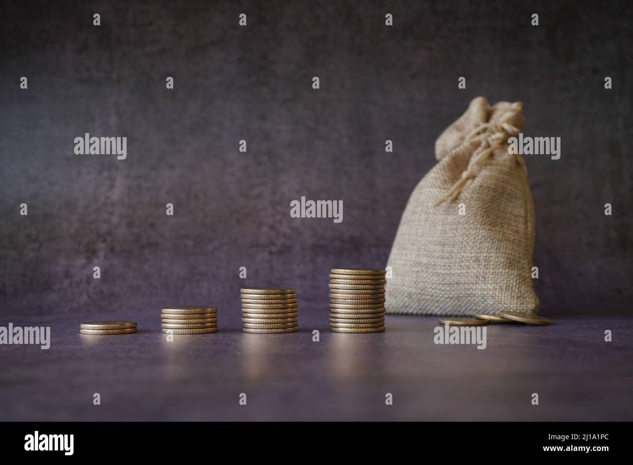 money-growth-concept-where-small-coins-in-a-pile-gets-bigger-and