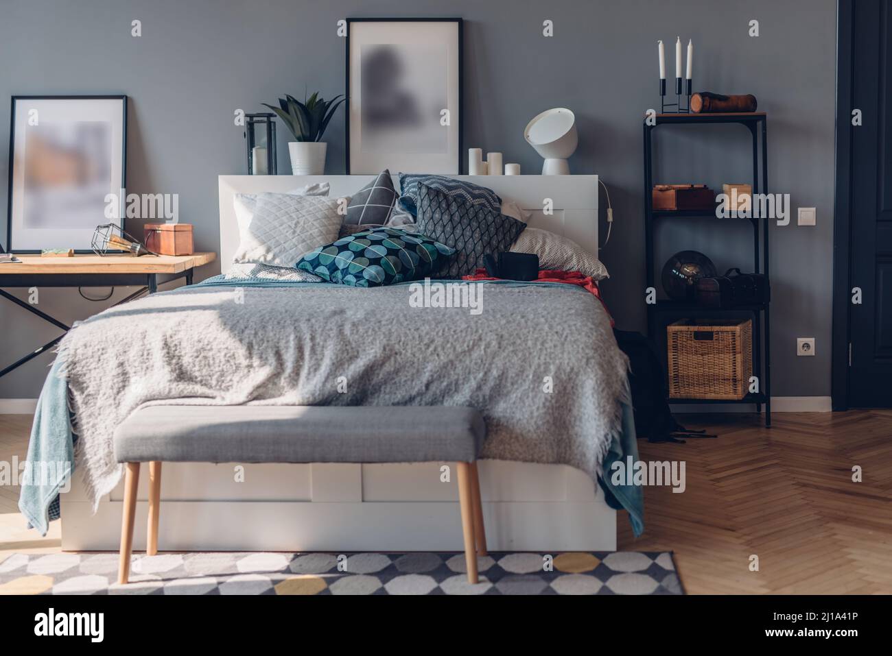 Large bed, home cozy interior bedroom in apartment Stock Photo - Alamy