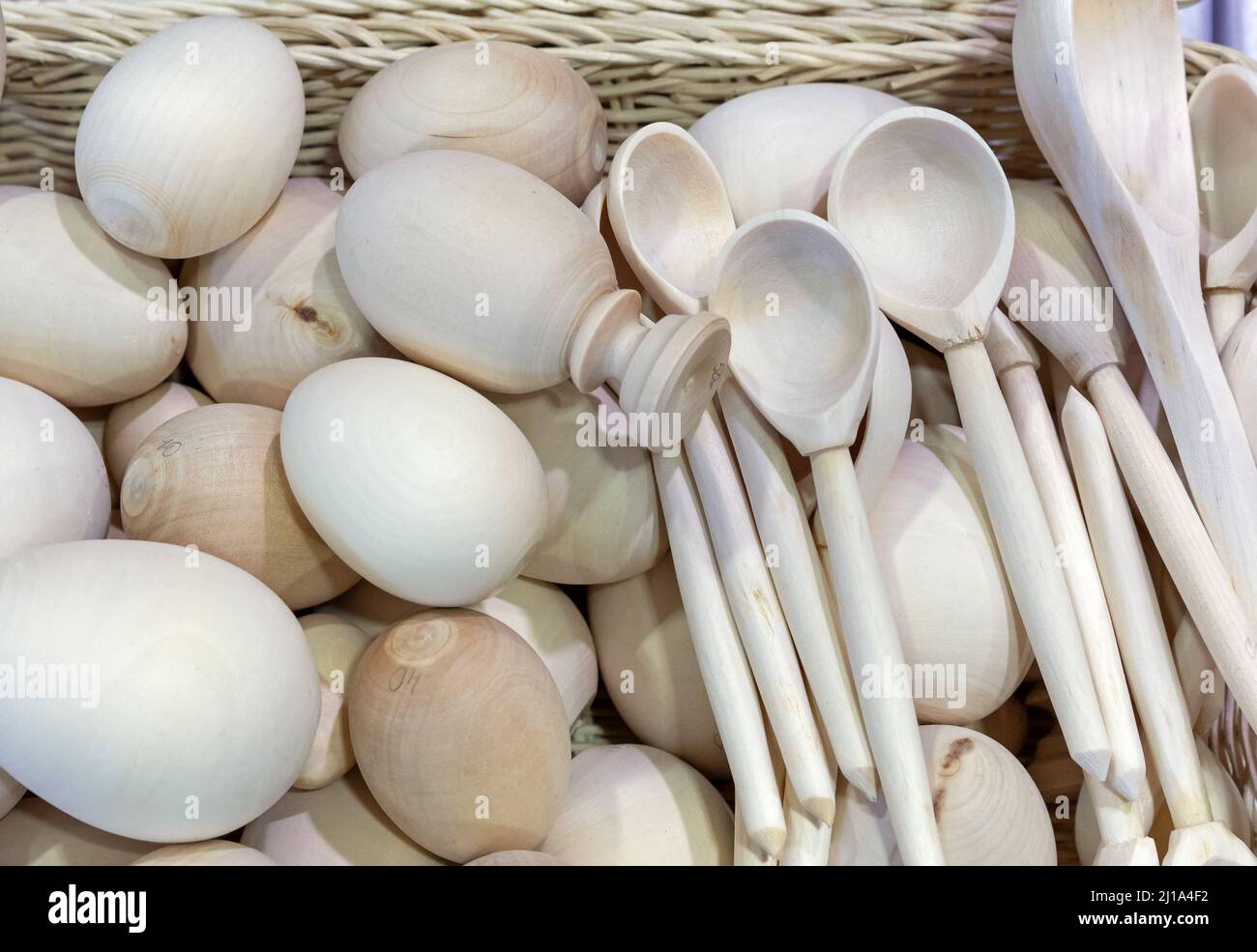 Wooden Easter eggs and wooden spoons for self-coloring with paints for the Easter holiday. Stock Photo