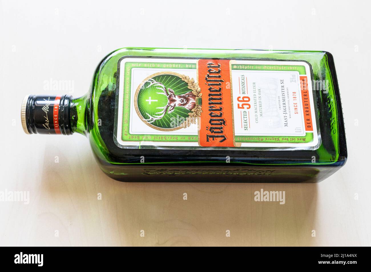 Moscow, Russia - March 20, 2022: lying bottle of Jagermeister liqueur on  pale table. Jagermeister is German digestif made with 56 herbs and spices,  it Stock Photo - Alamy