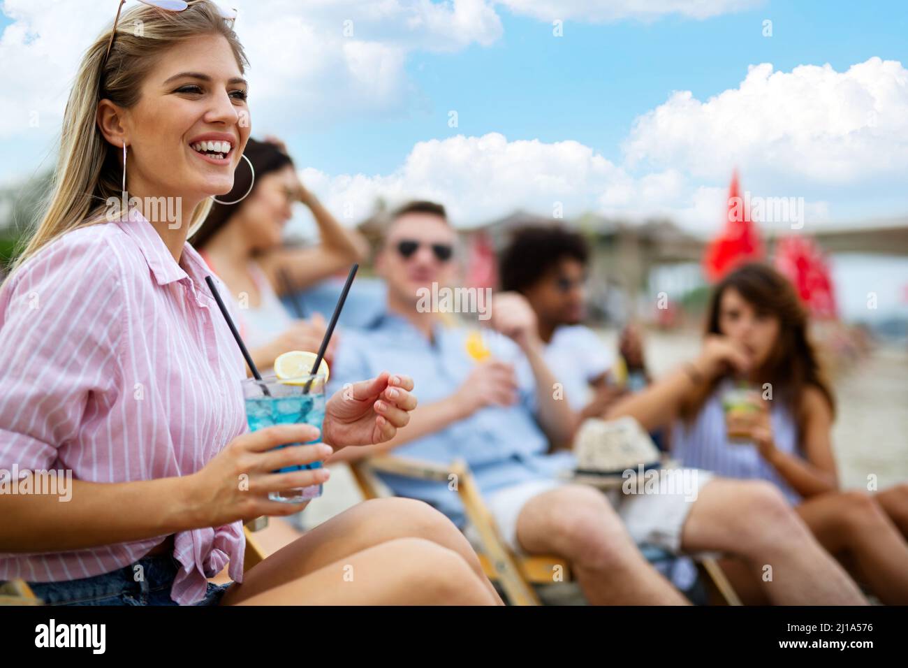Friends Support Fun Portrait of friends having fun together on beach vacation. Student ...
