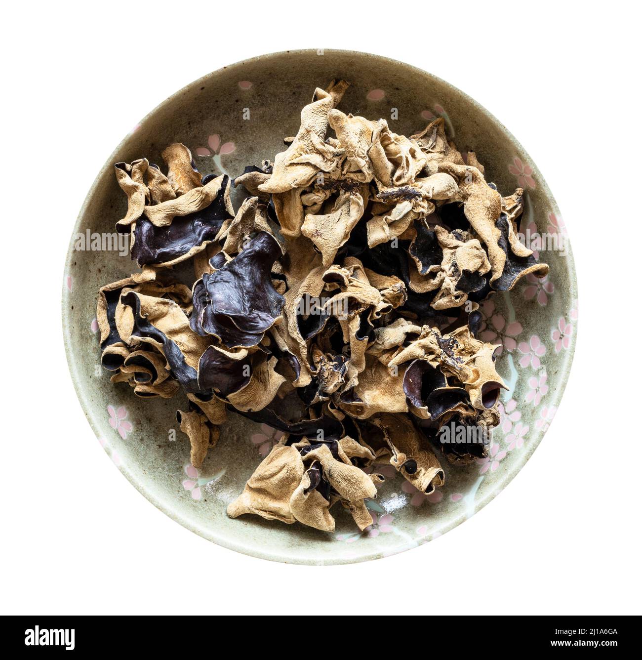 top view of dried chinese black wood ear fungus in bowl isolated on