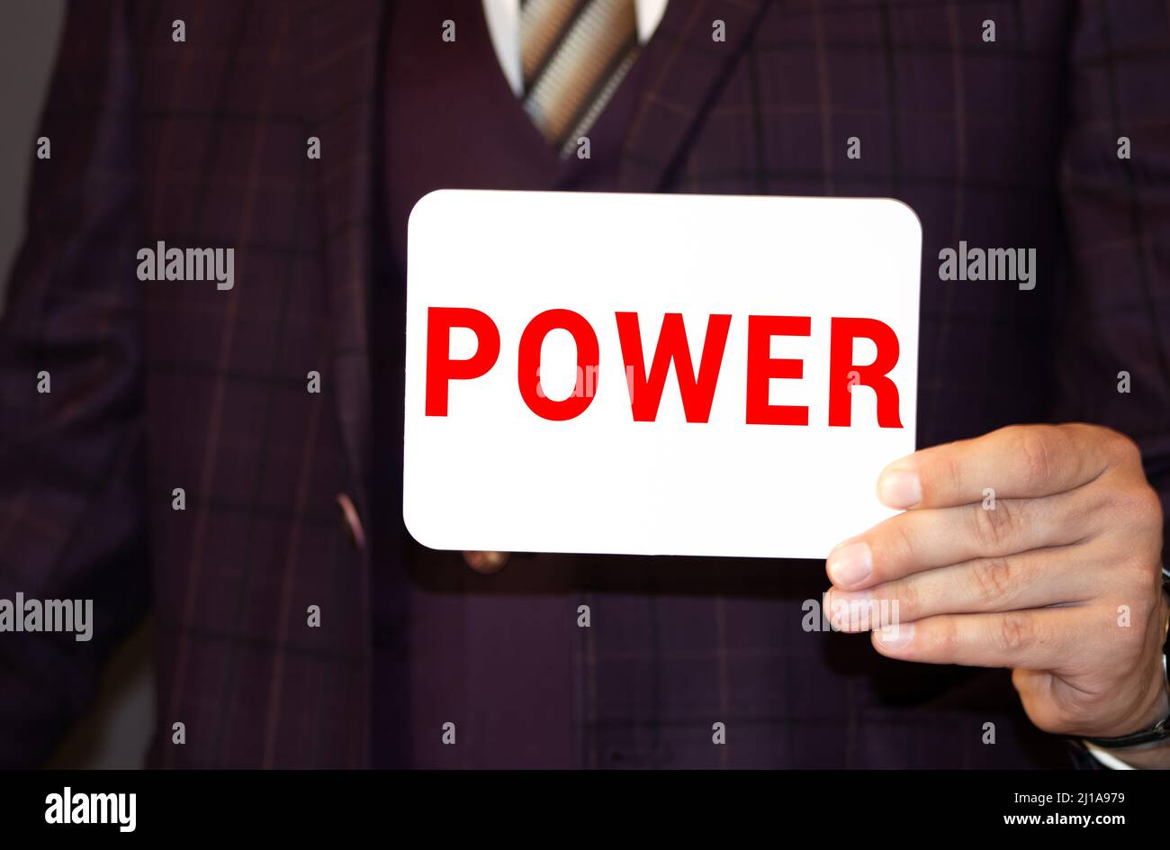 Many Hands Holding the Colorful Word Power, Isolated. Stock Photo