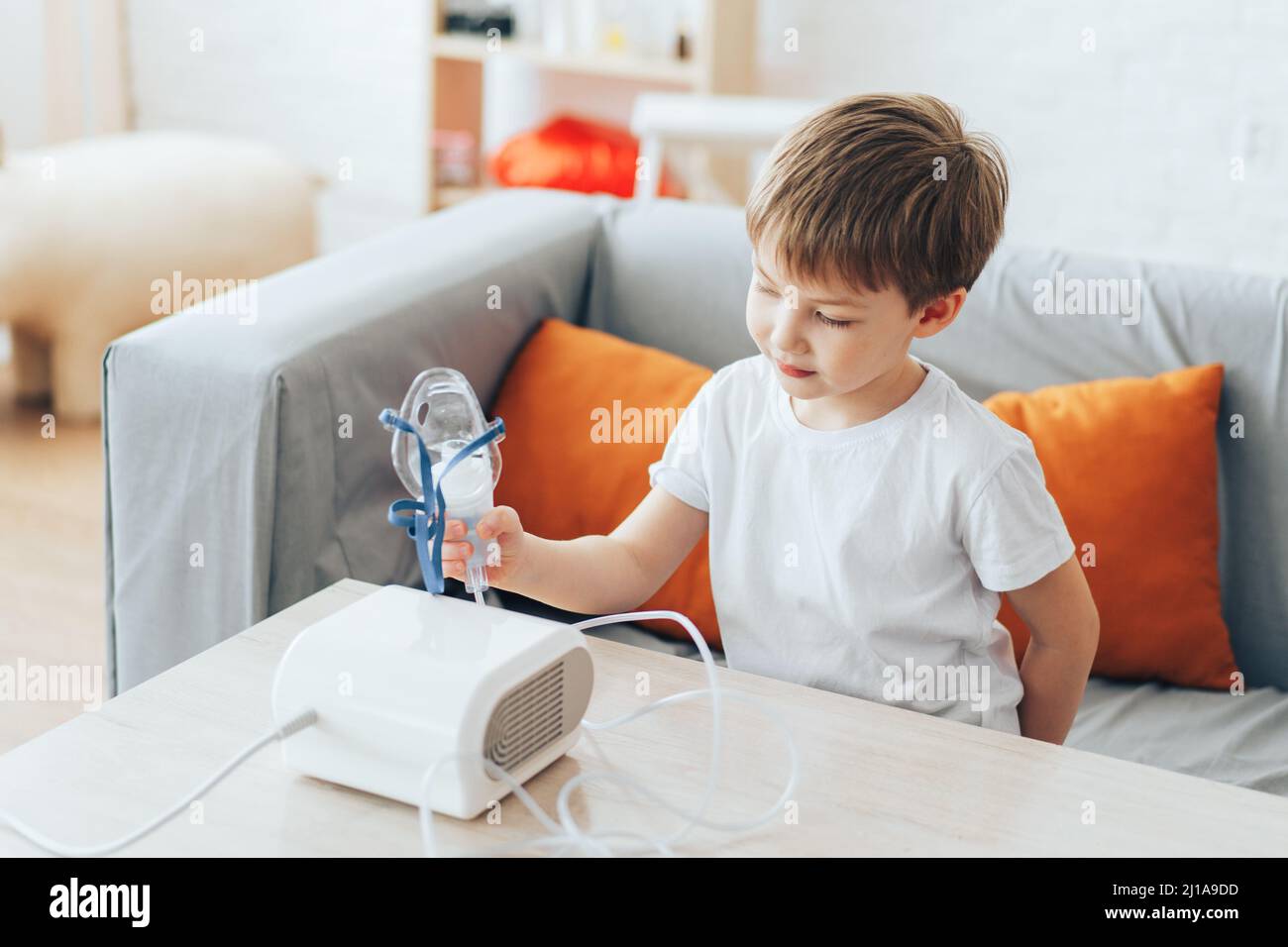 Boy oxygen mask home hi-res stock photography and images - Alamy
