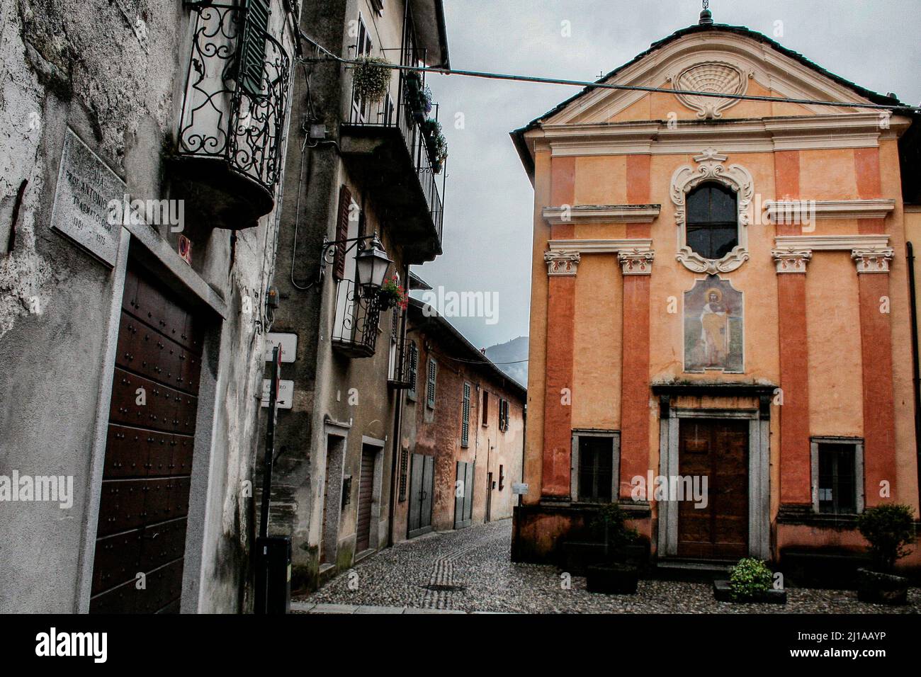 Orta San Giulio, an Italian town in the province of Novara in Piedmont. It is part of the circuit of the most beautiful villages in Italy. St. Roch church (Oratorio di San Rocco), 16th century. Stock Photo