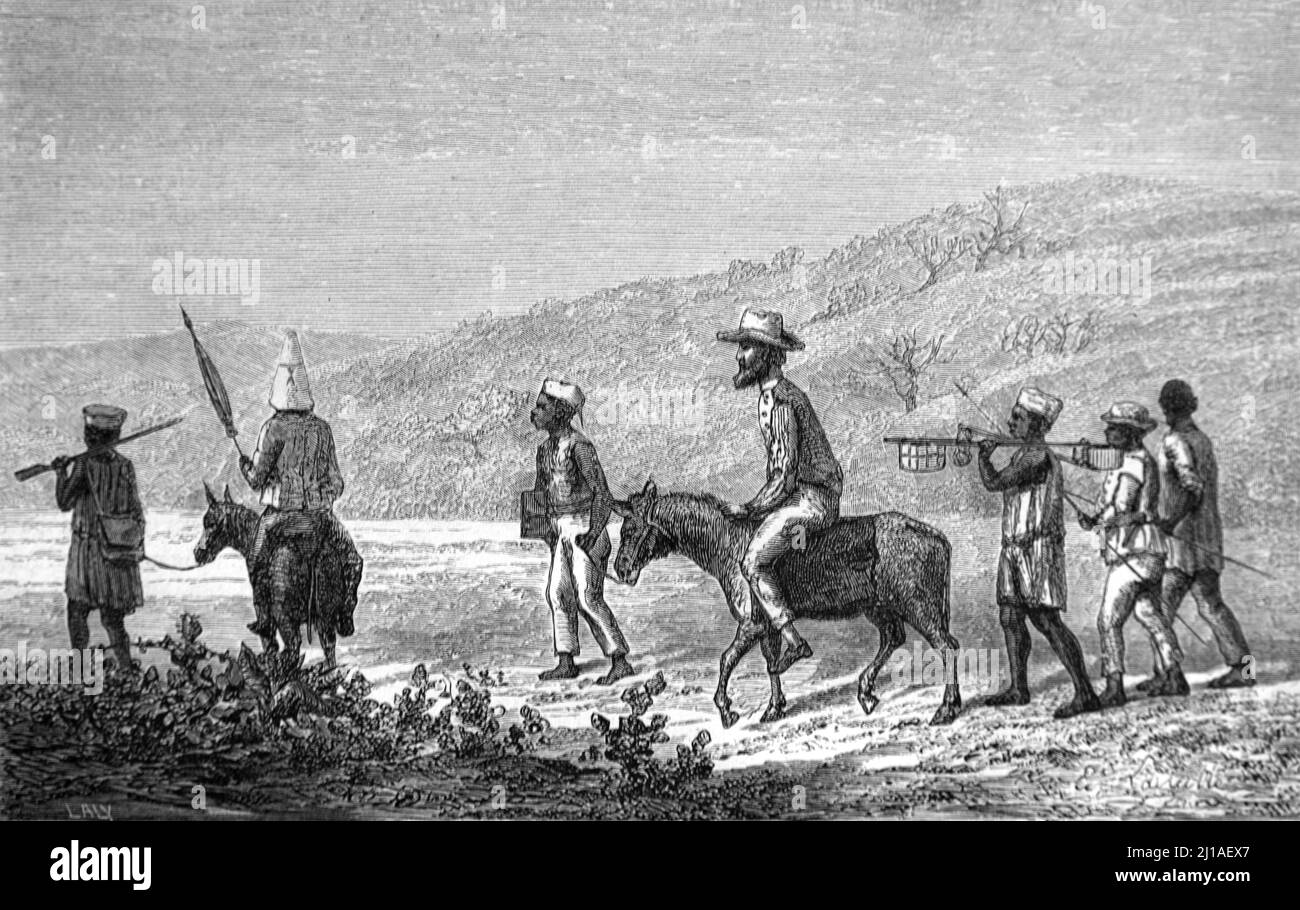 Captain or Sir Richard Francis Burton (1821-1890) Riding a Mule & with Native African Porters Exploring Central Africa during his Exploration of the African Great Lakes Region (1856-1860) Africa. Vintage Illustration or Engraving 1860. Stock Photo
