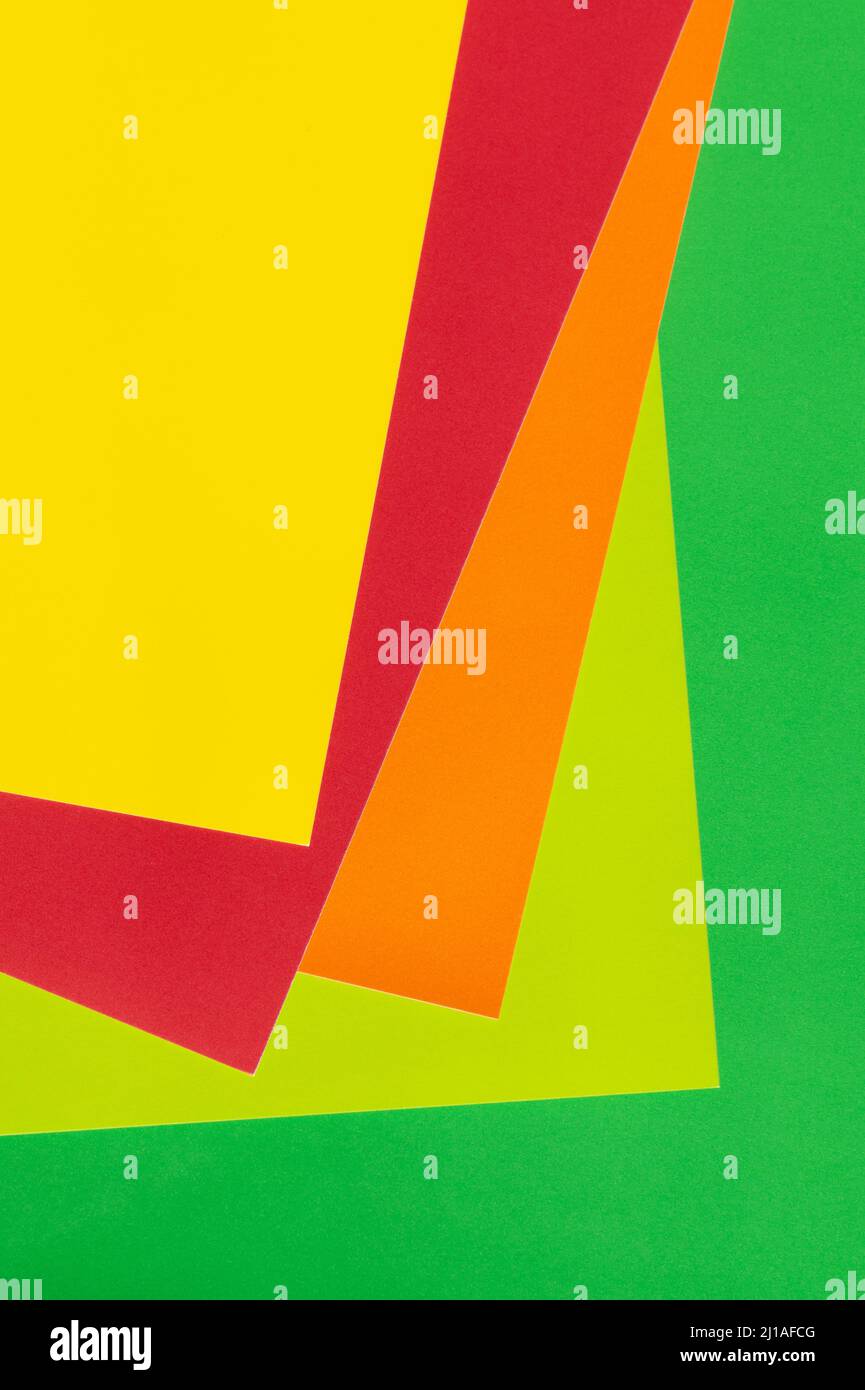 simple background with yellow, red, orange and green paper sheets Stock ...