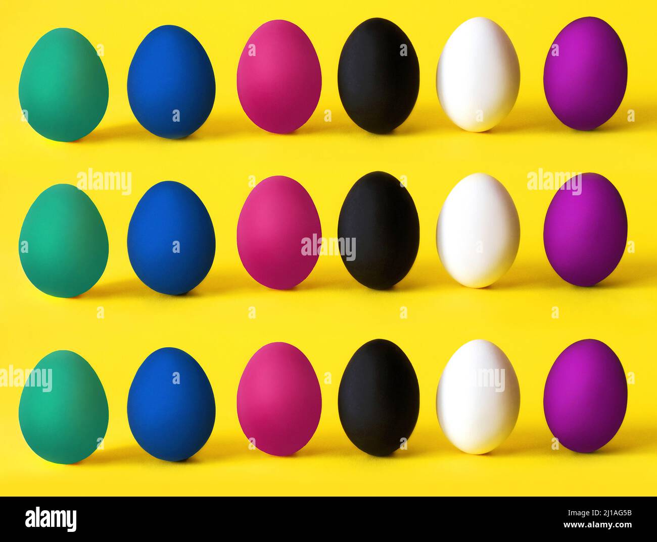 Colorful eggs on the yellow background. Black lives matter, all lives matter, diversity, equal rights concept Stock Photo
