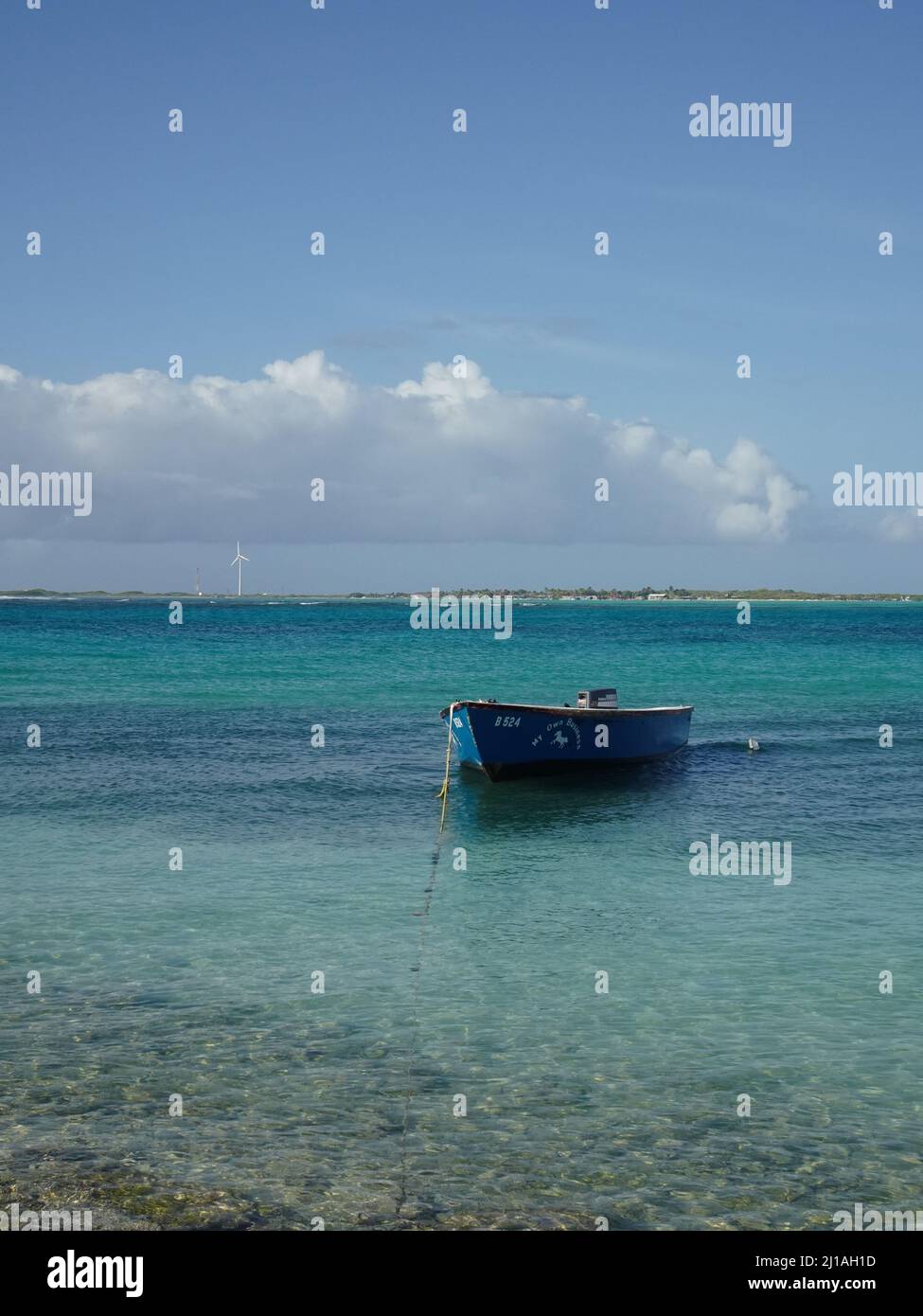 Boat on blue water hi-res stock photography and images - Alamy