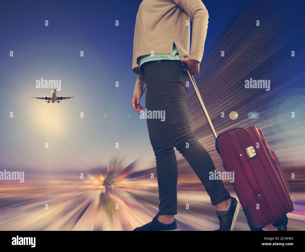 Woman carries luggage Stock Photo Alamy