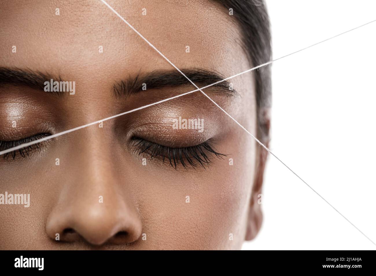 Eyebrow threading epilation procedure for brow shape correction
