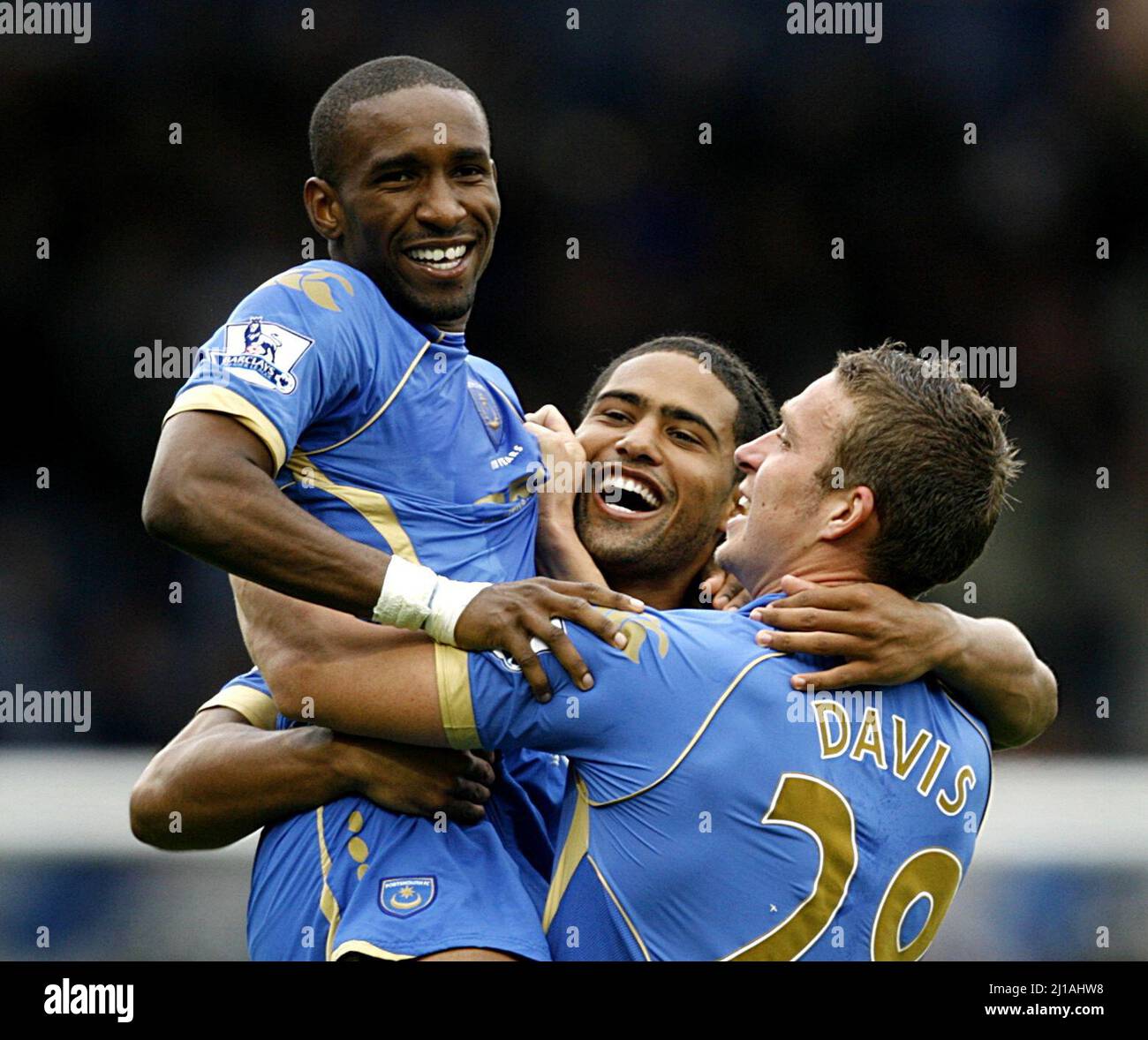 File photo dated 05-10-2008 of Portsmouth's Jermain Defoe is picked up by his team mates. Former England striker Jermain Defoe has announced his retirement from professional football at the age of 39. Issue date: Thursday March 24, 2022. Stock Photo