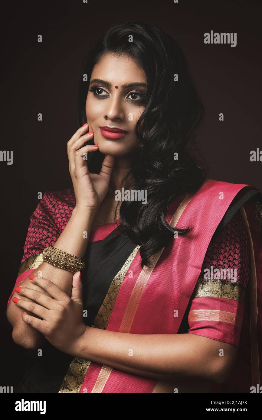 Girl wearing red saree hi-res stock photography and images - Alamy