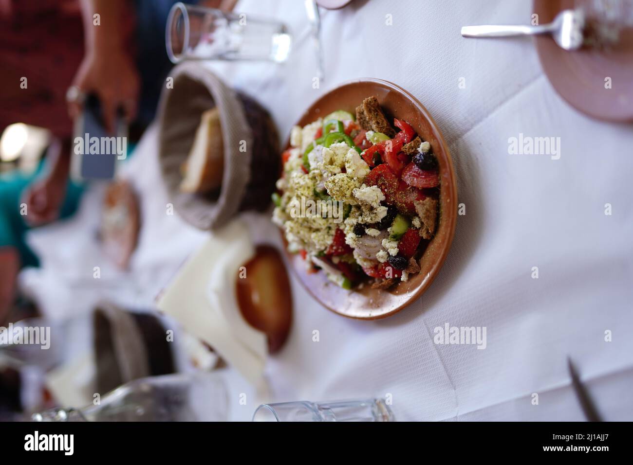The closeup shot of traditional greek goat cheese salad Stock Photo