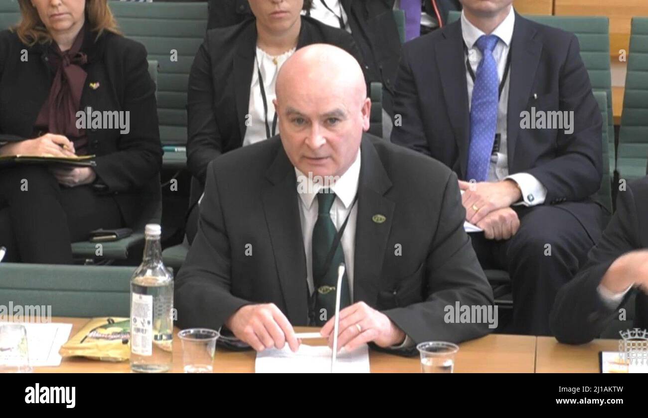 Mick Lynch, general secretary of the Rail, Maritime and Transport union (RMT), answering questions in front of the Transport Committee and Business, Energy and Industrial Strategy Select Committee in the House of Commons, London, on the subject of P&O Ferries after the ferry giant handed 800 seafarers immediate severance notices last week. Picture date: Thursday March 24, 2022. Stock Photo
