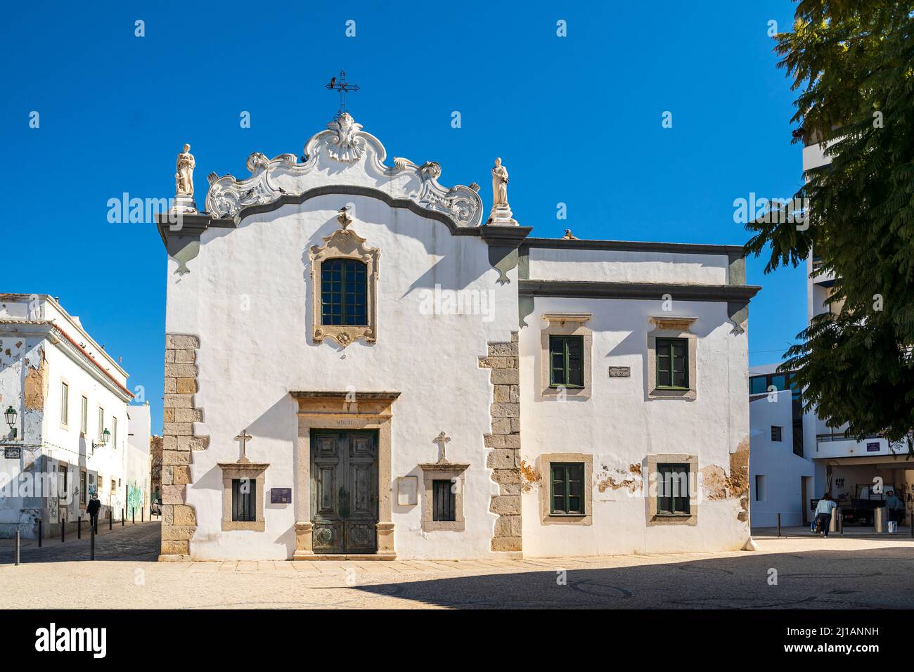 Historic church named Nossa Senhora do Pe da Cruz in the downtown of Faro, Algarve, Portugal Stock Photo
