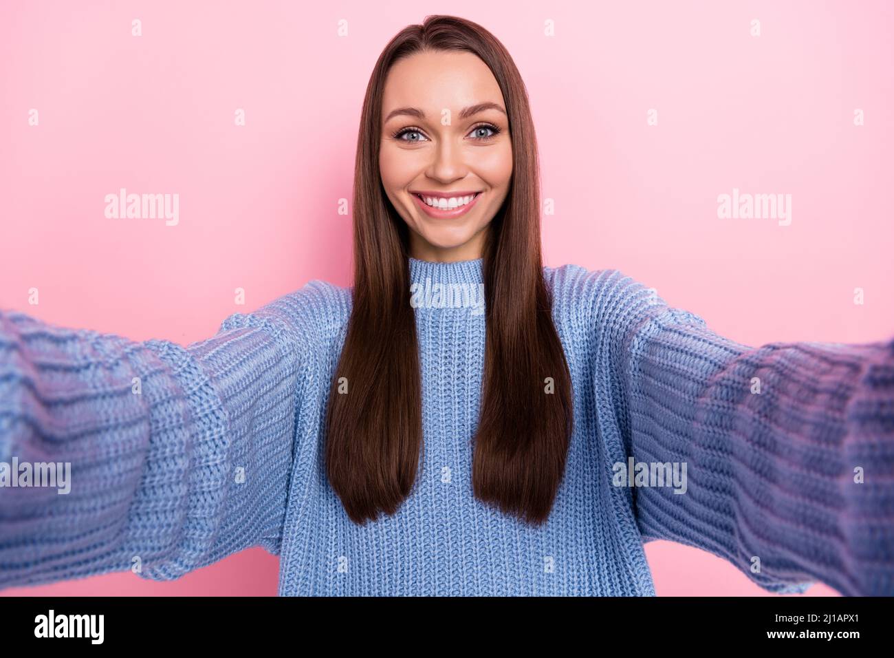 Photo of impressed millennial brunette lady do selfie wear blue sweater ...