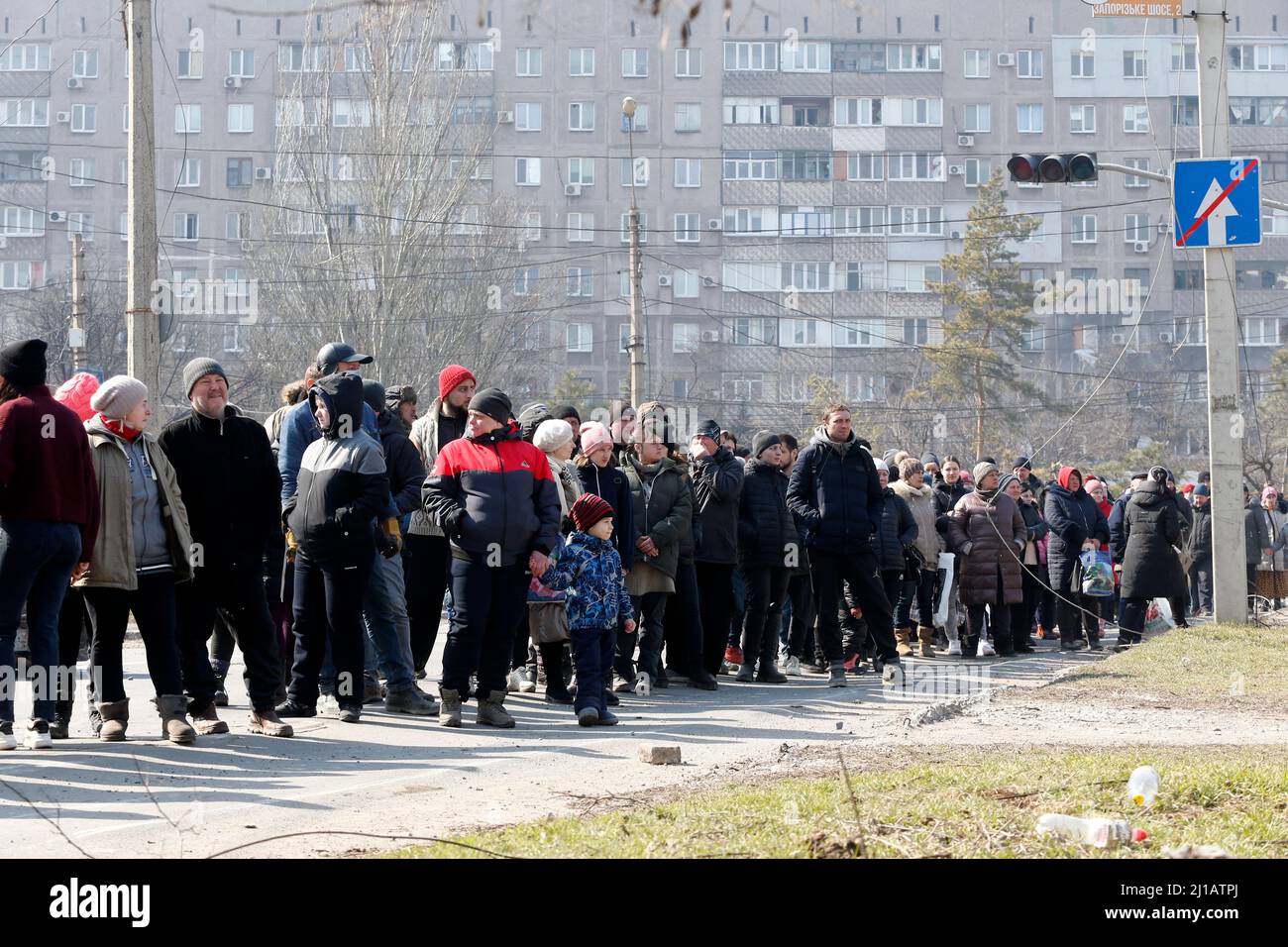 Mariupol, Ukraine. 23rd Mar, 2022. People queue up to receive humanitarian relief supplies in Mariupol, Ukraine, March 23, 2022. Credit: Victor/Xinhua/Alamy Live News Stock Photo