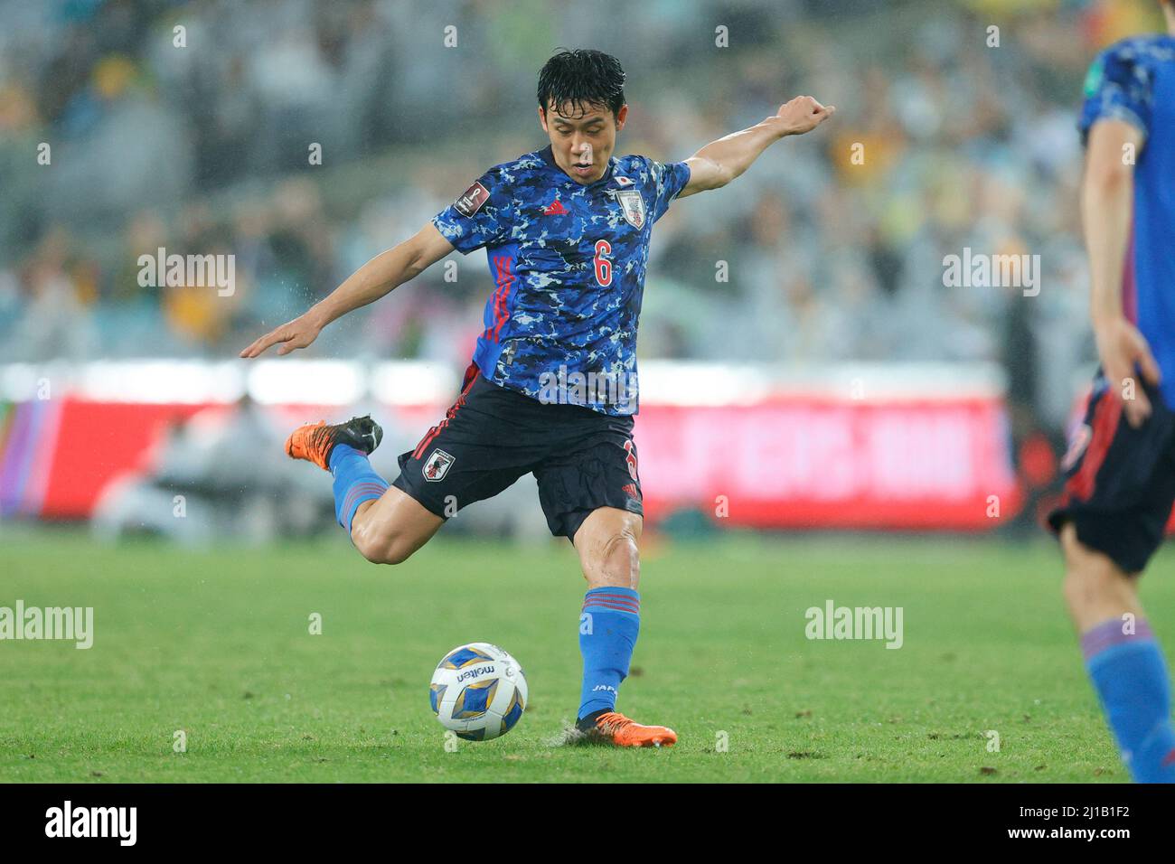 Sydney, Australia. 24th Mar, 2022. Wataru Endo of Japan shoots during the FIFA World Cup 2022 Qualifier match between Australia and Japan at Accors Stadium, Sydney, Australia on 24 March 2022. Photo by Peter Dovgan. Editorial use only, license required for commercial use. No use in betting, games or a single club/league/player publications. Credit: UK Sports Pics Ltd/Alamy Live News Stock Photo