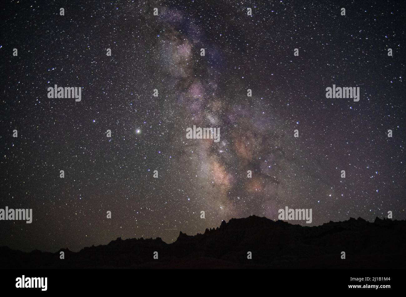 A magical view of the Milky Way starry sky over the Badlands National ...