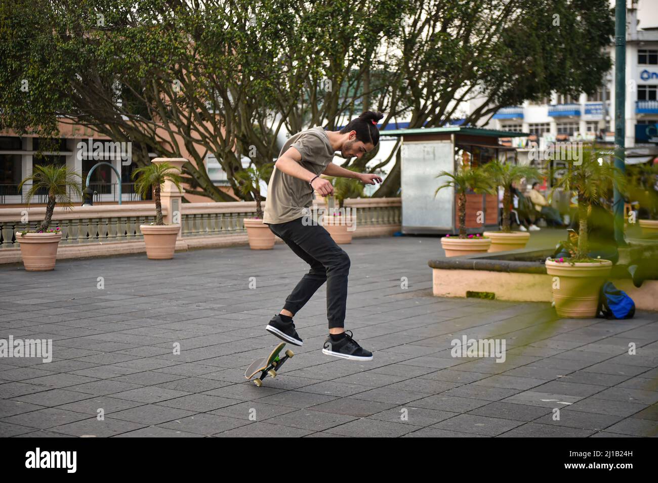 skateboards practicing tricks on the Juárez Park in Xalapa Mexico Stock