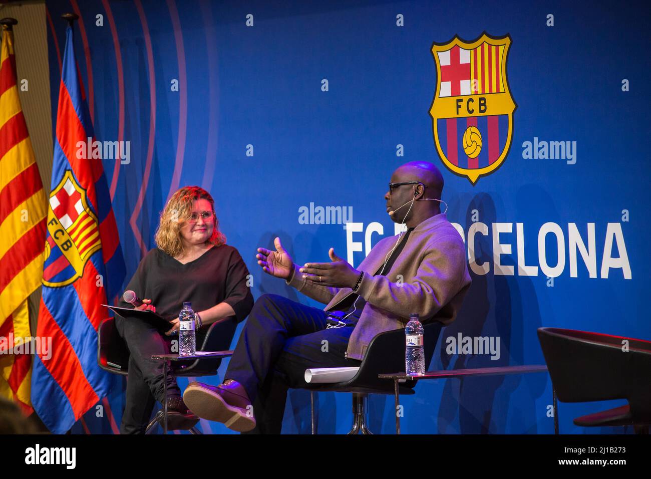 Lilian Thuram (R), former FC Barcelona player and founder of the Lilian Thuram Foundation for Education against Racism is seen speaking Rita Marzoa (L), journalist and moderator of the FC Barcelona event, 'Sport as a tool for social inclusion”. The Public Diplomacy Council of Catalonia, DIPLOCAT and the FC Barcelona Foundation have organized an event on sport as a tool for social inclusion, being opened with a talk with Lilian Thuram, former French FC Barcelona player and creator of the Lilian Thuram Foundation for Education against Racism, who spoke about education and racism in the context o Stock Photo