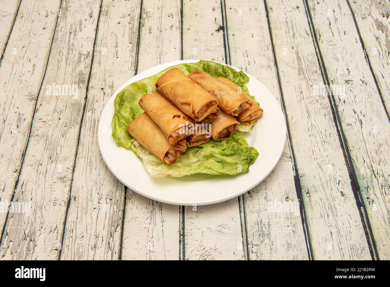 Mini spring rolls with sweet and sour sauce, a recipe for appetizers